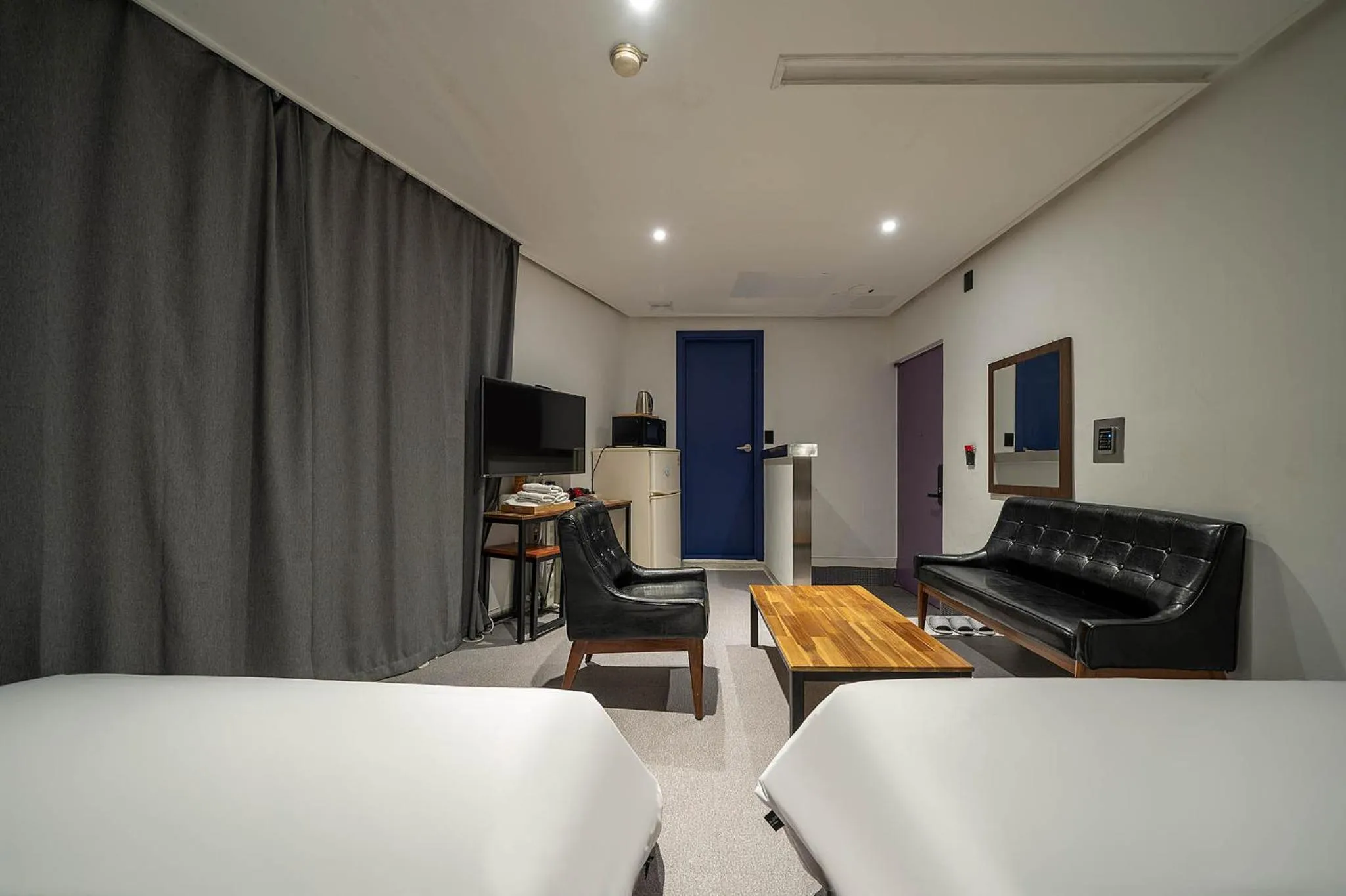 Bed in Pacific7 Hotel