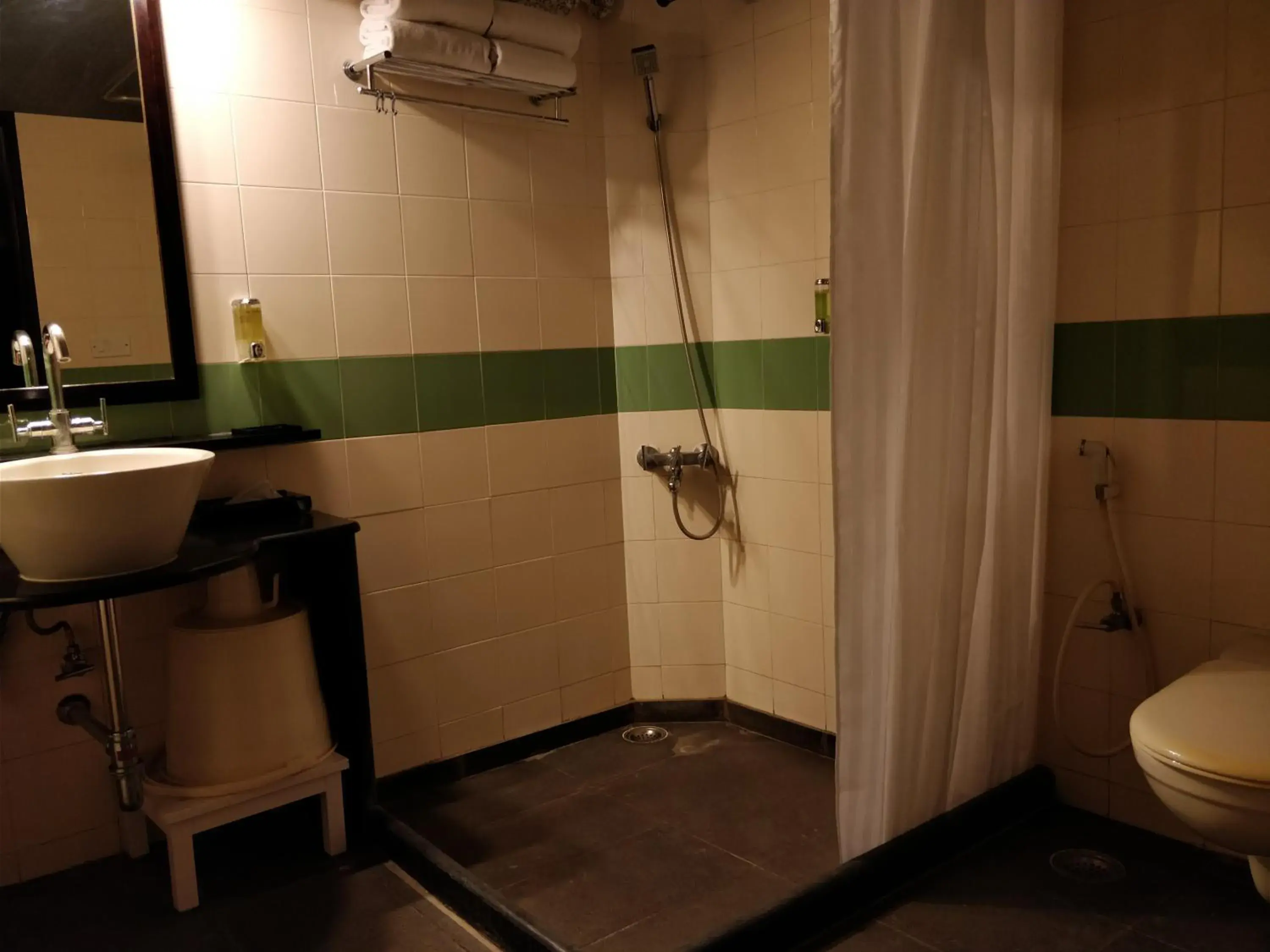 Bathroom in Olde Bangalore Resort and Wellness Center Bathroom in Olde Bangalore Resort and Wellness Center