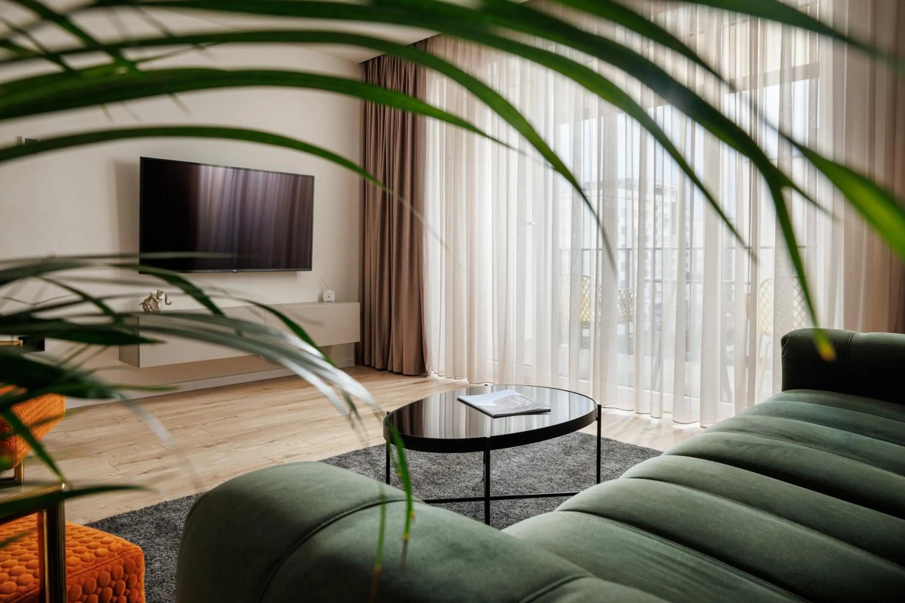 Living room in The Alley by Kanopian