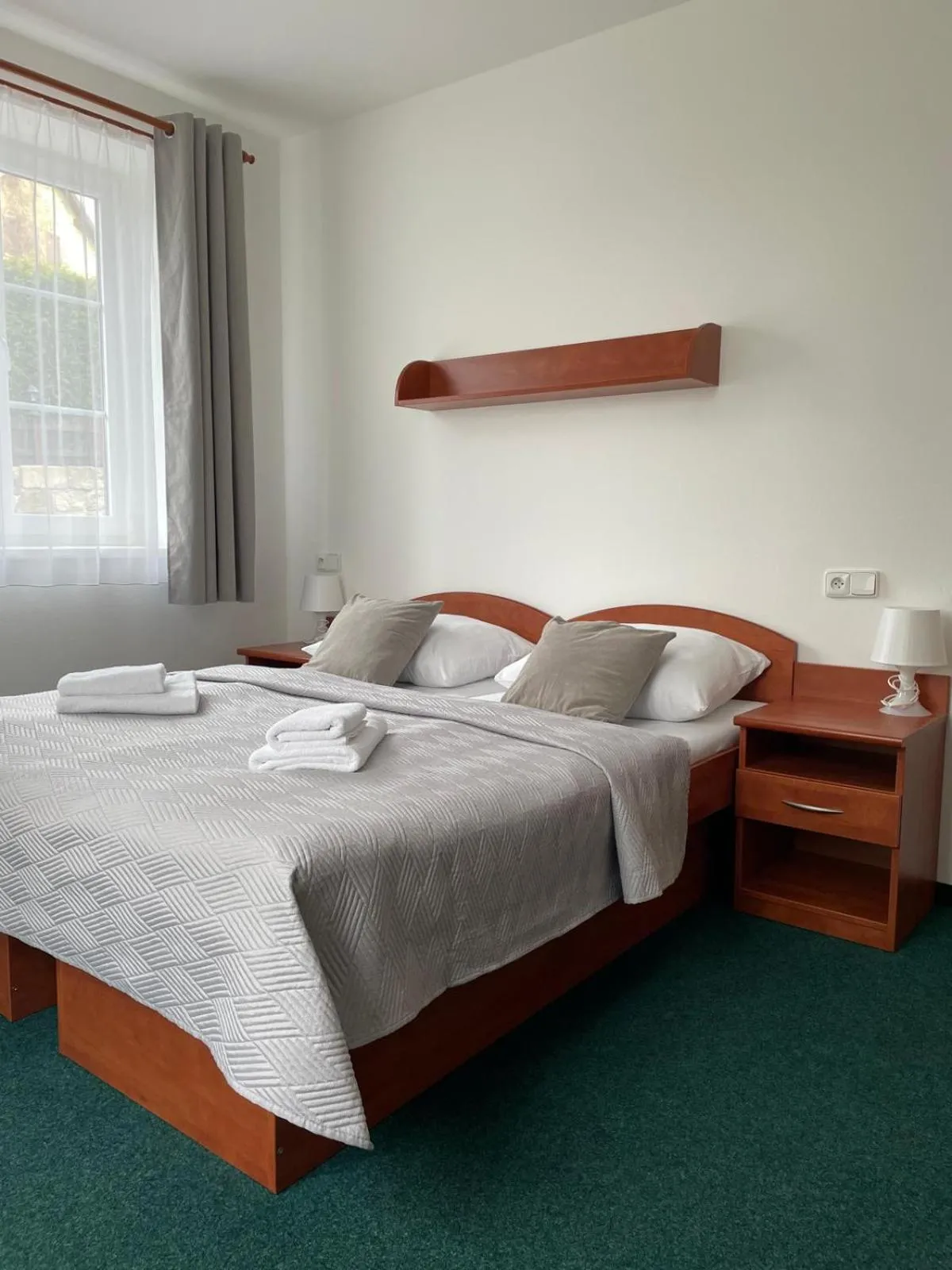 Bed in Hotel Karolina