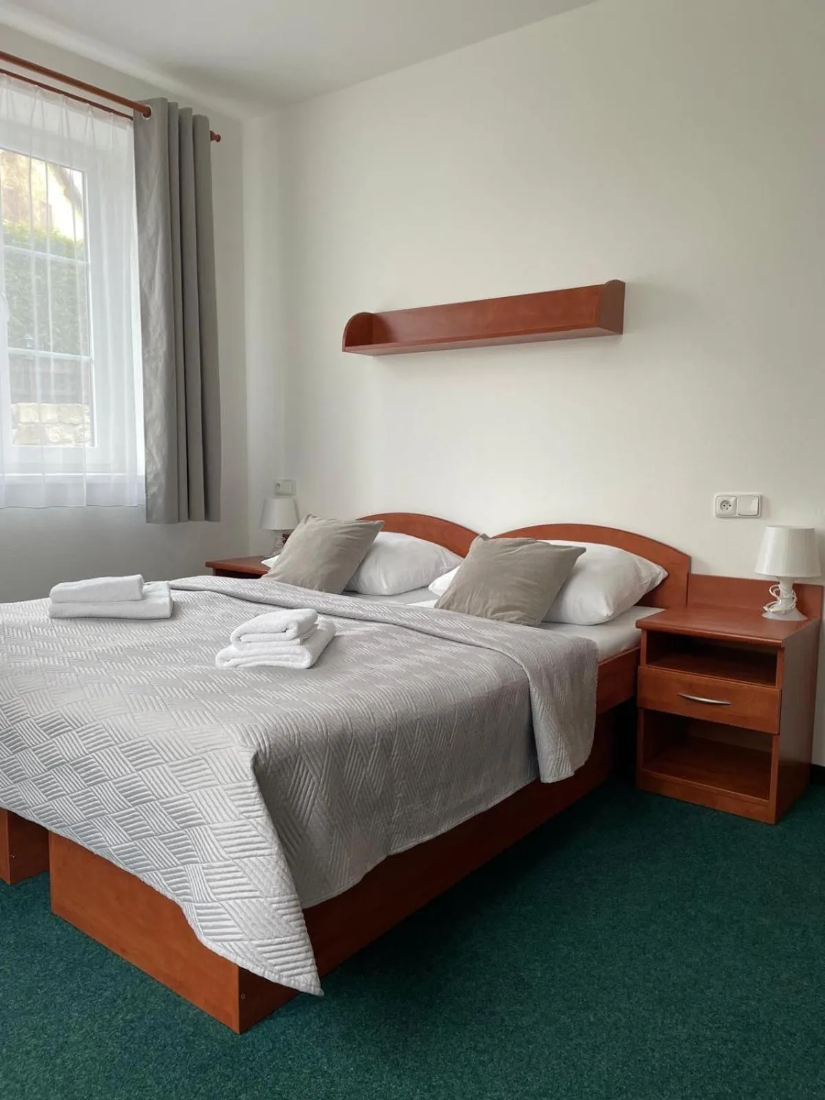 Bed in Hotel Karolina