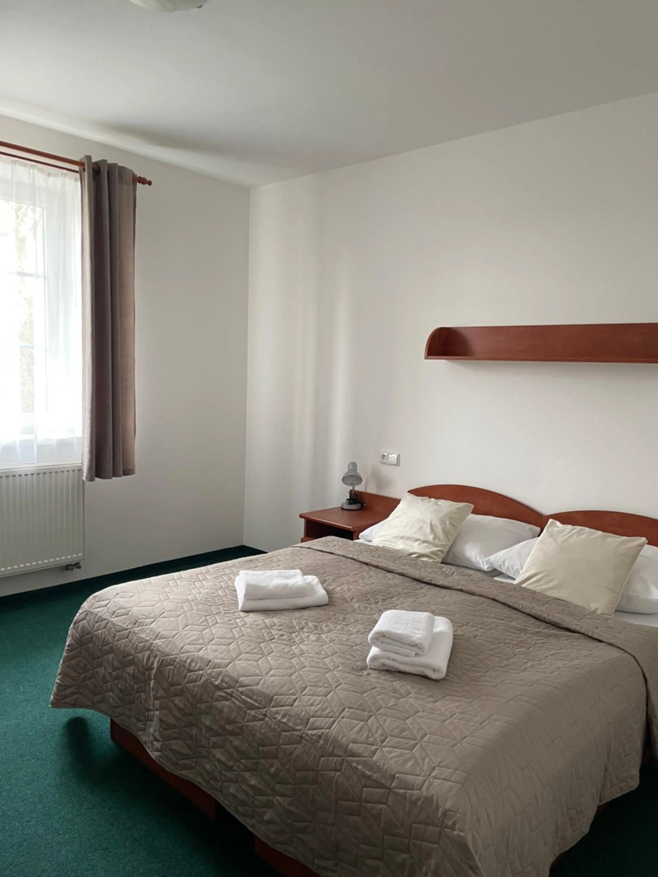 Bed in Hotel Karolina