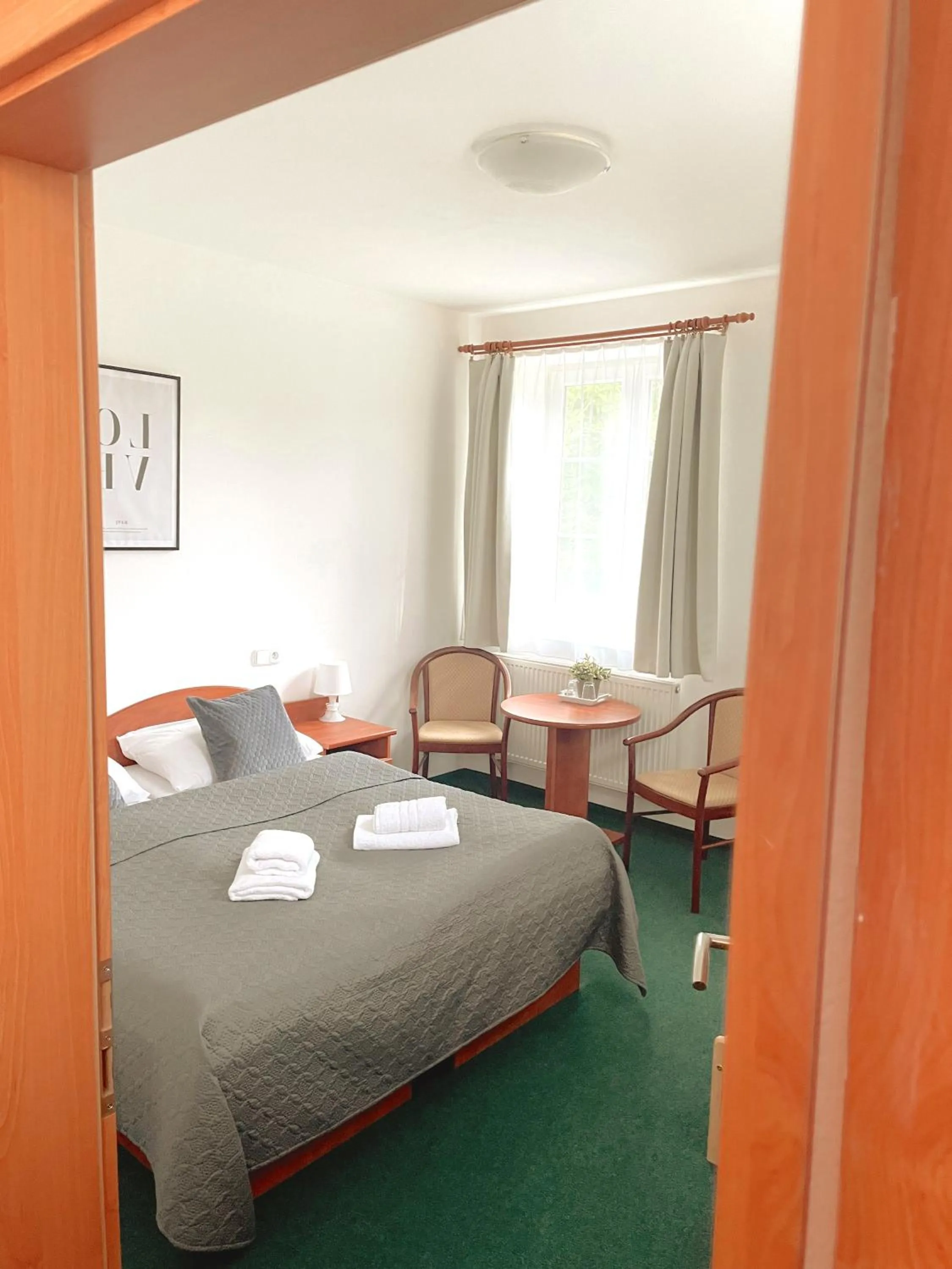 Bed in Hotel Karolina