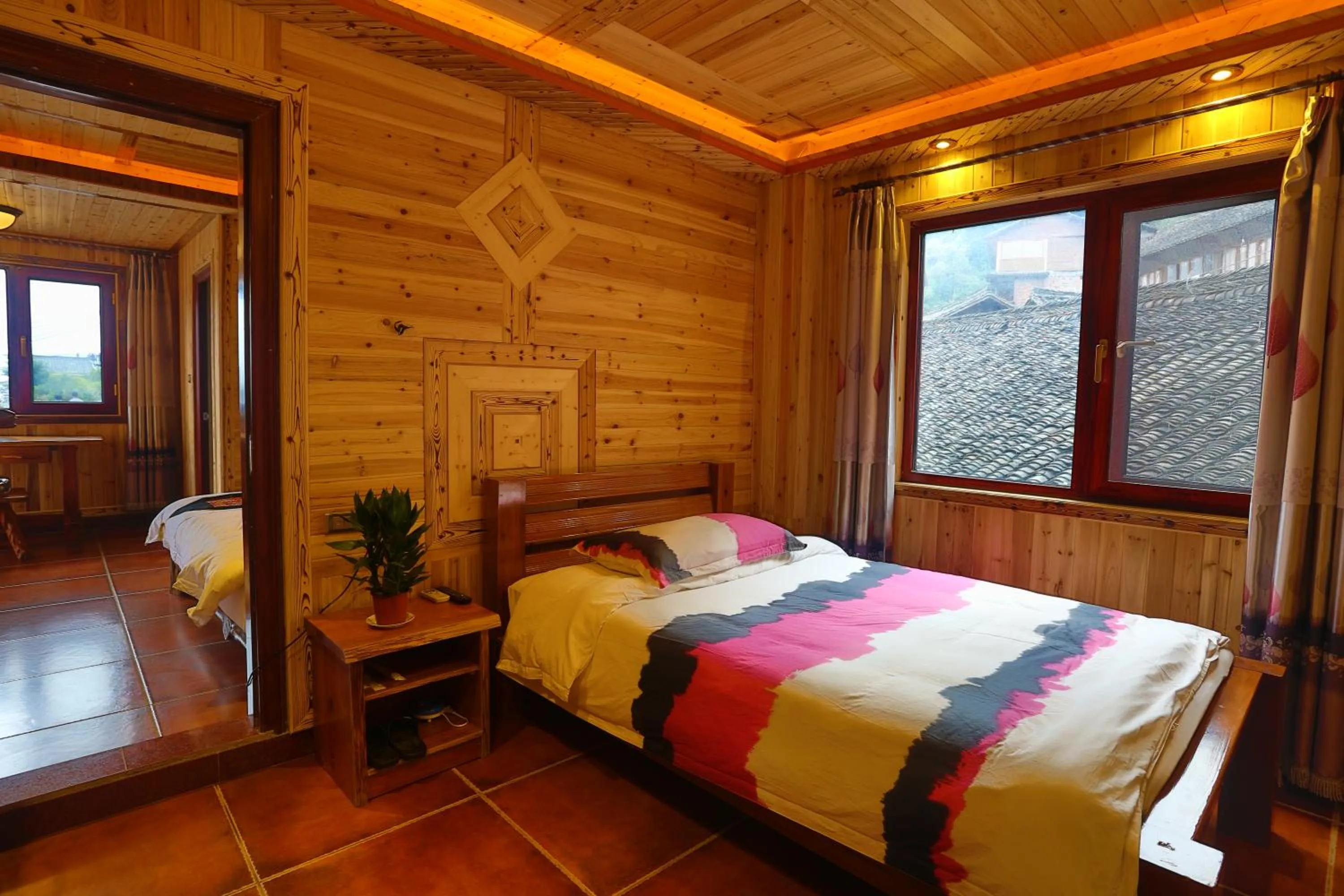 Photo of the whole room, Bed in Longji Holiday Hotel