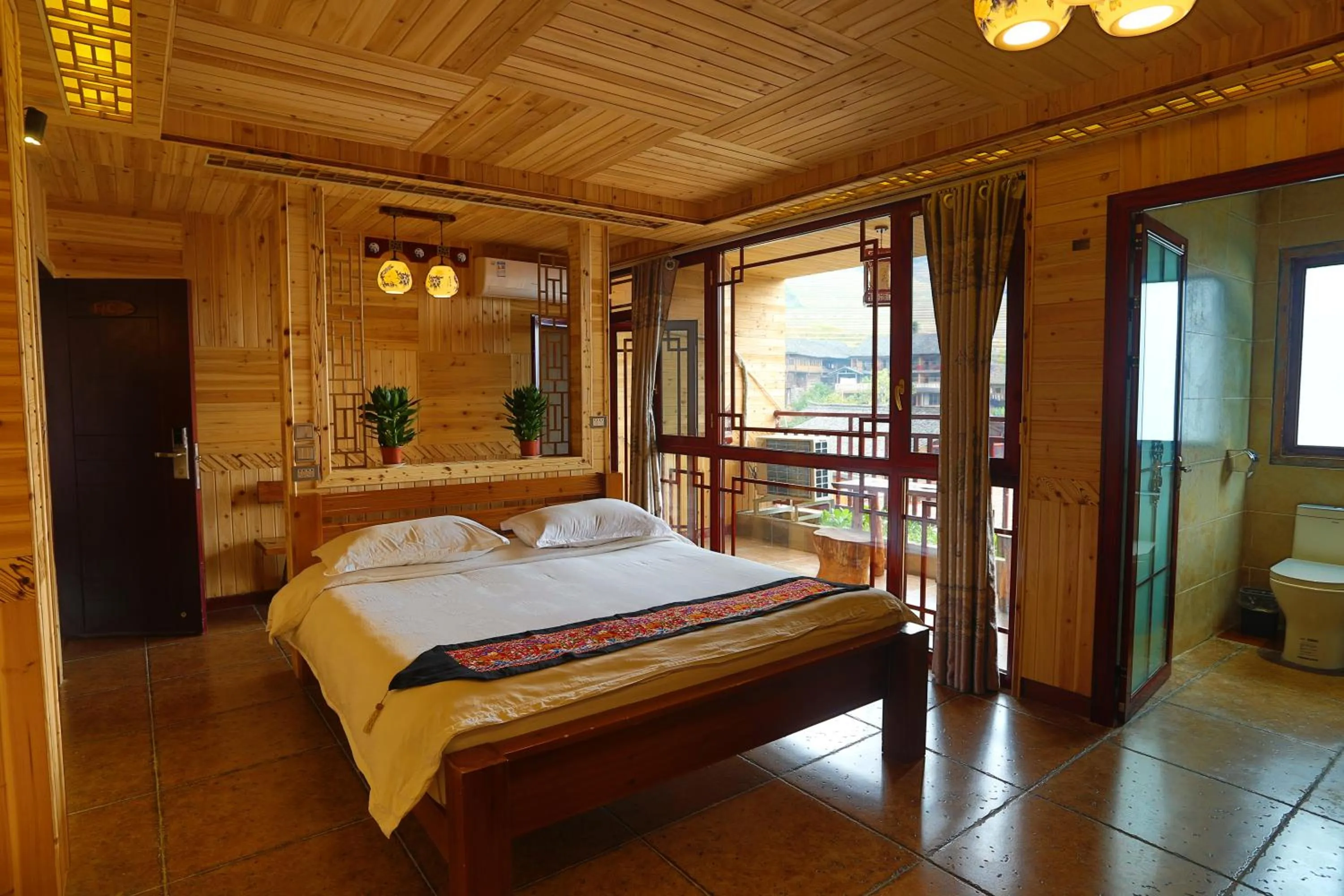 Photo of the whole room, Bed in Longji Holiday Hotel