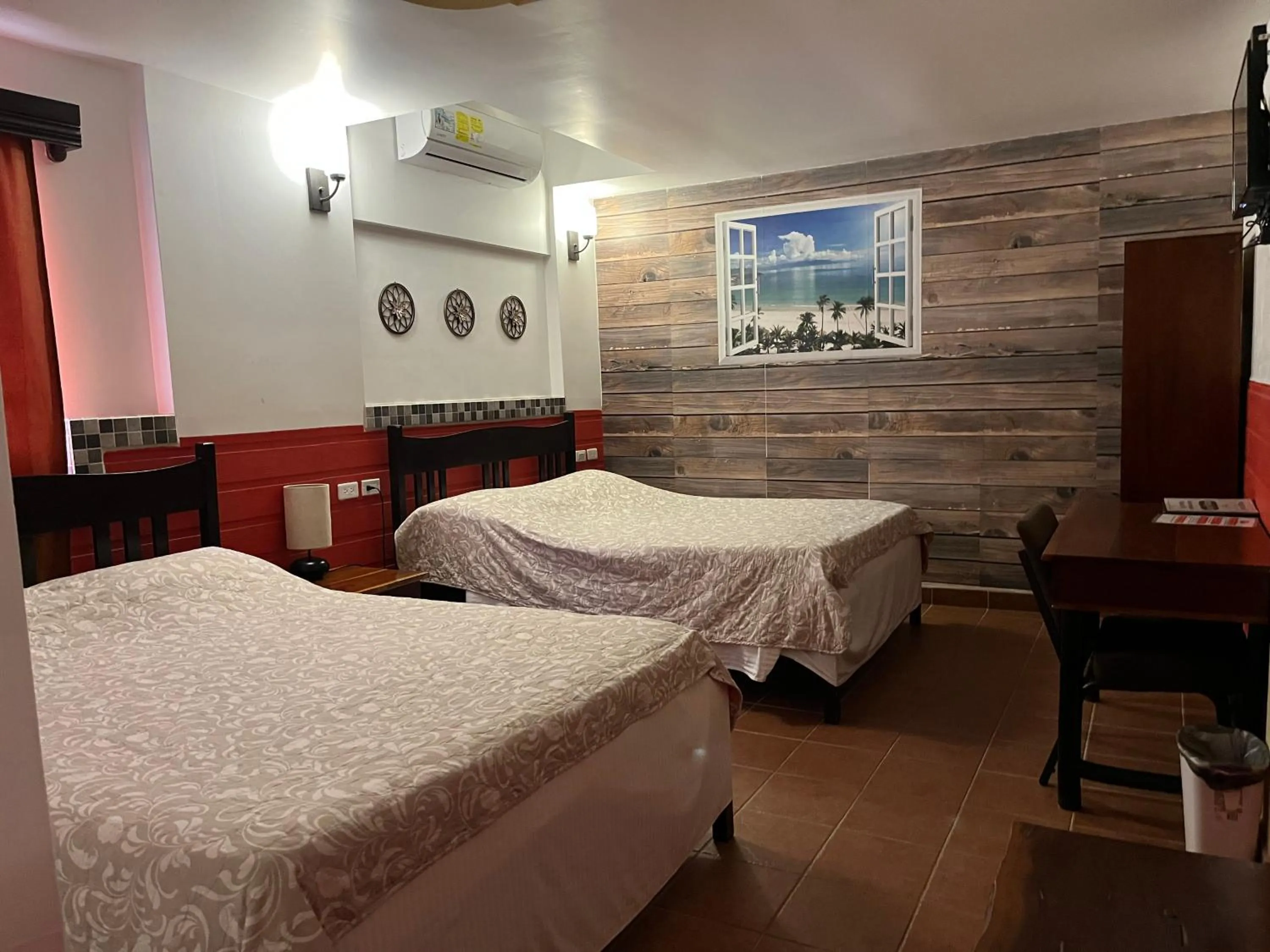 Bed in Easy Inn Hotel