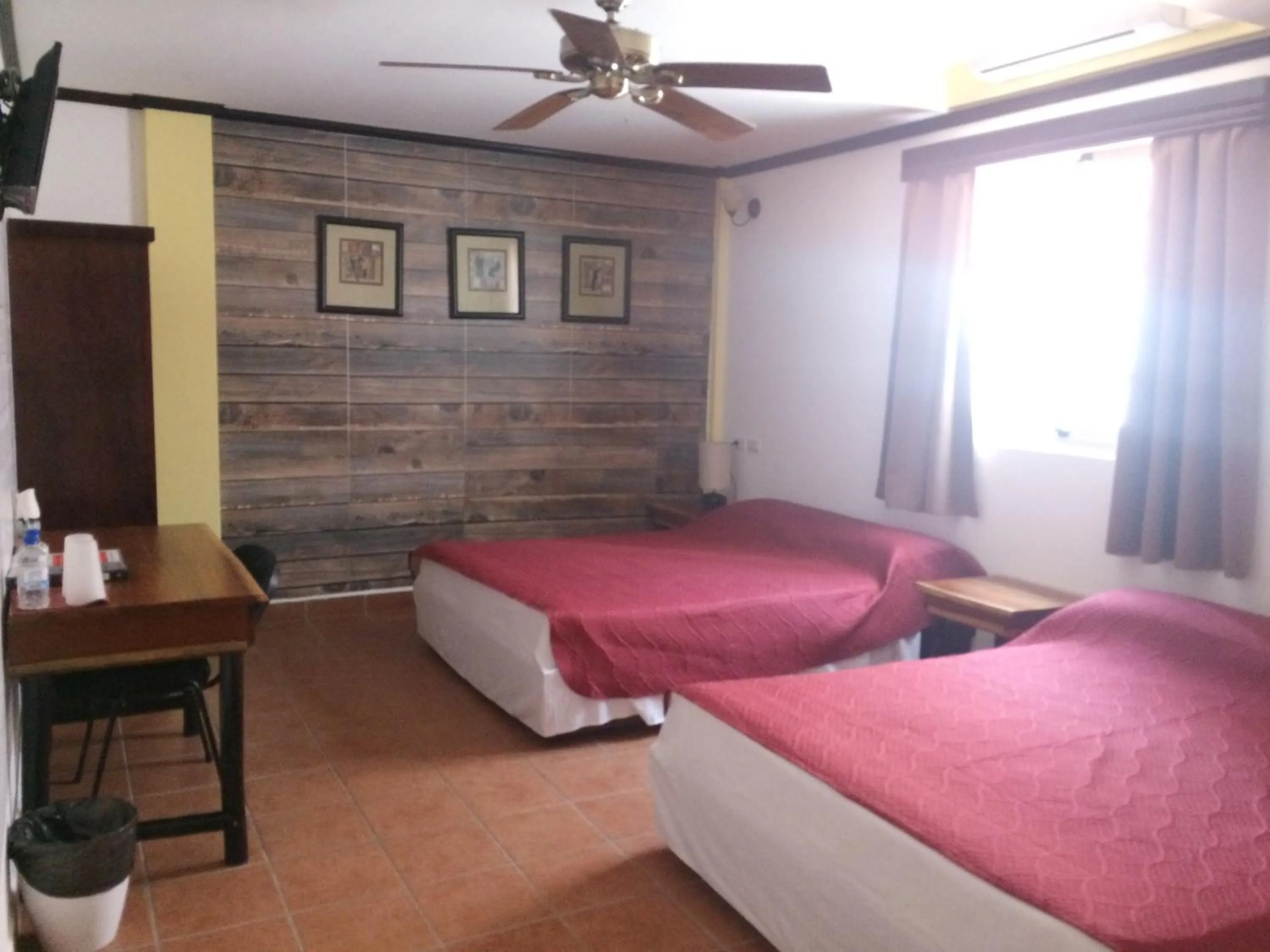 Bed in Easy Inn Hotel