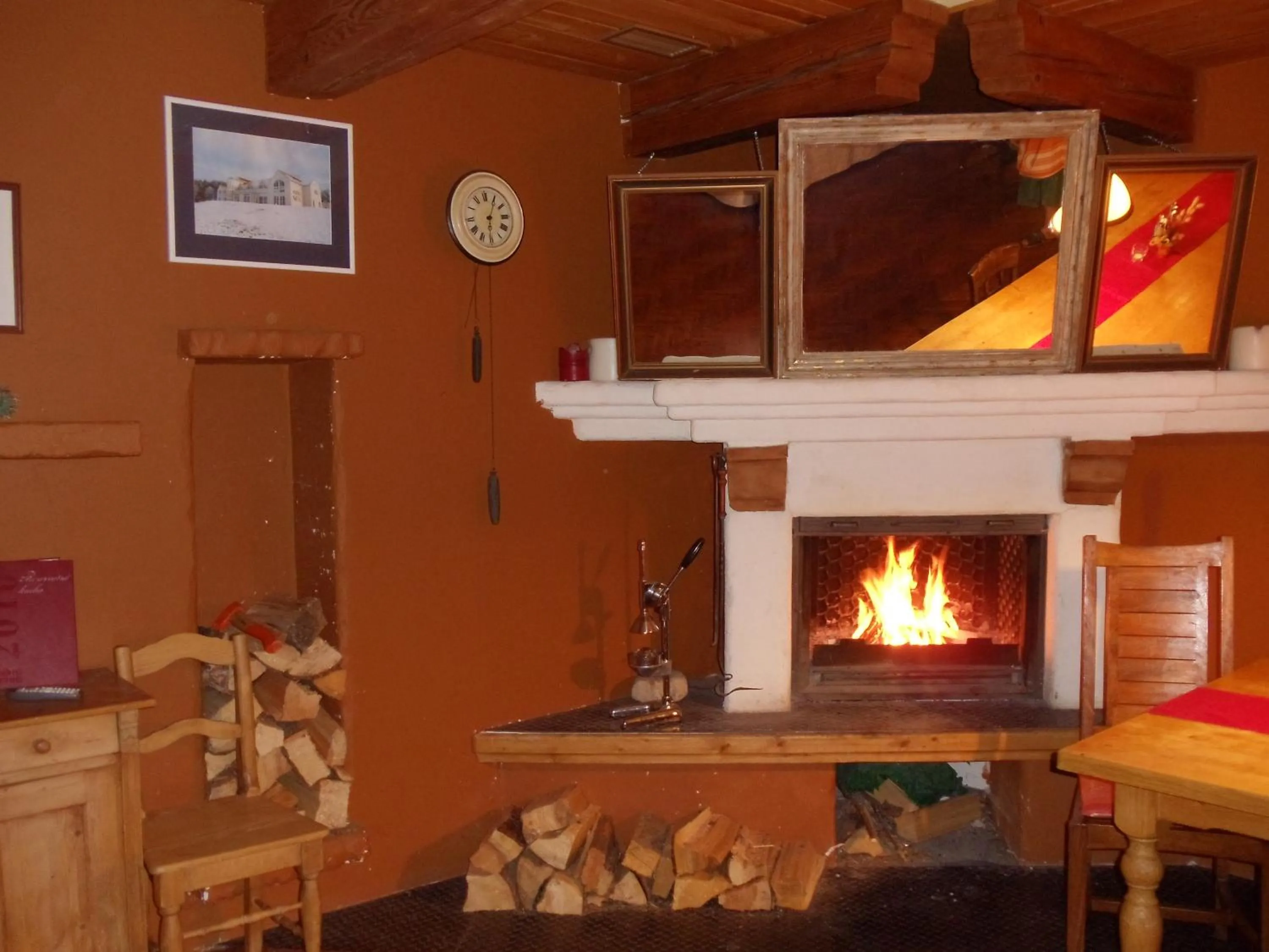 Communal lounge/ TV room in Alpský Hotel