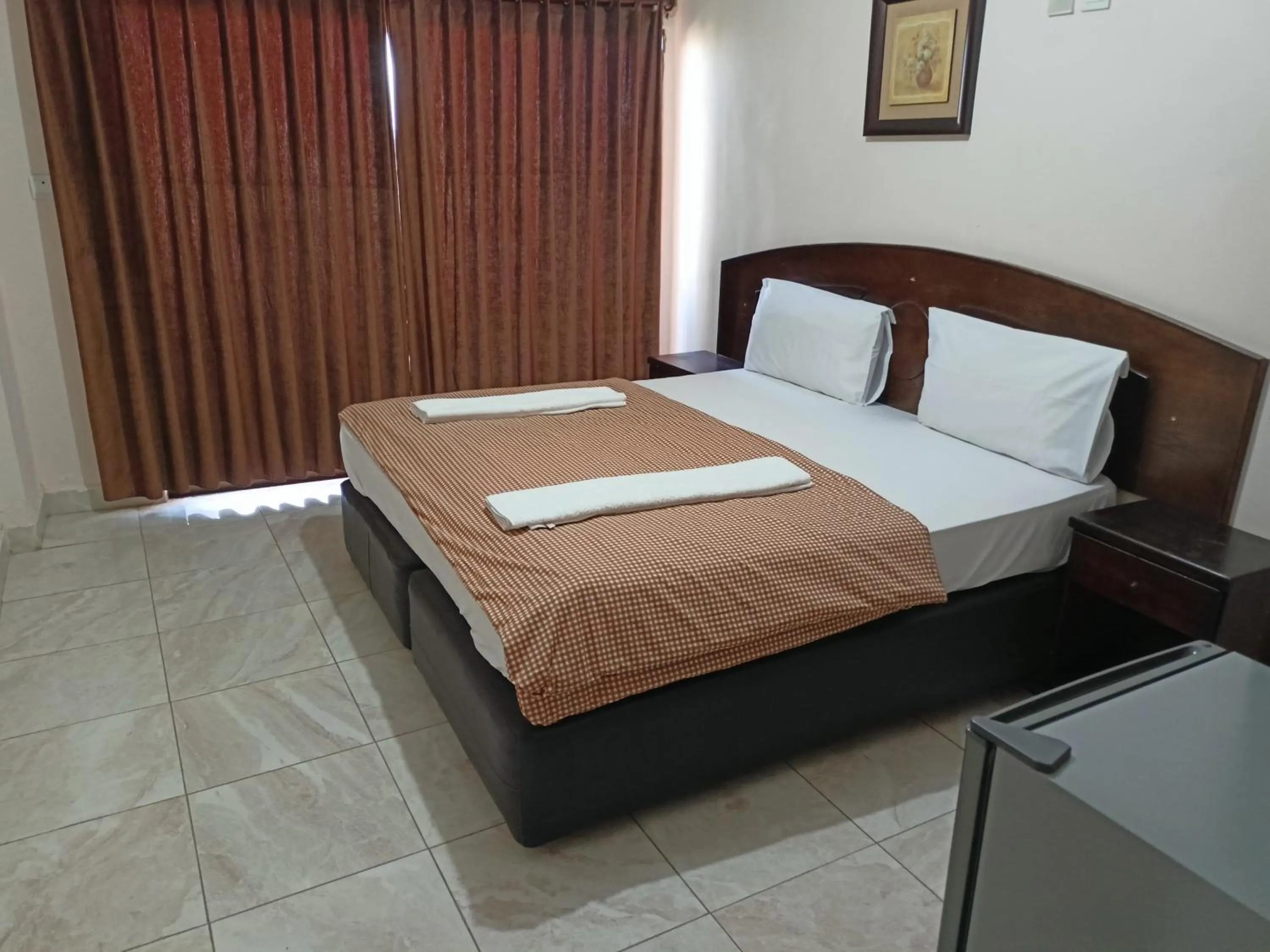 Bed in Baraka Al Aqaba Hotel Suites