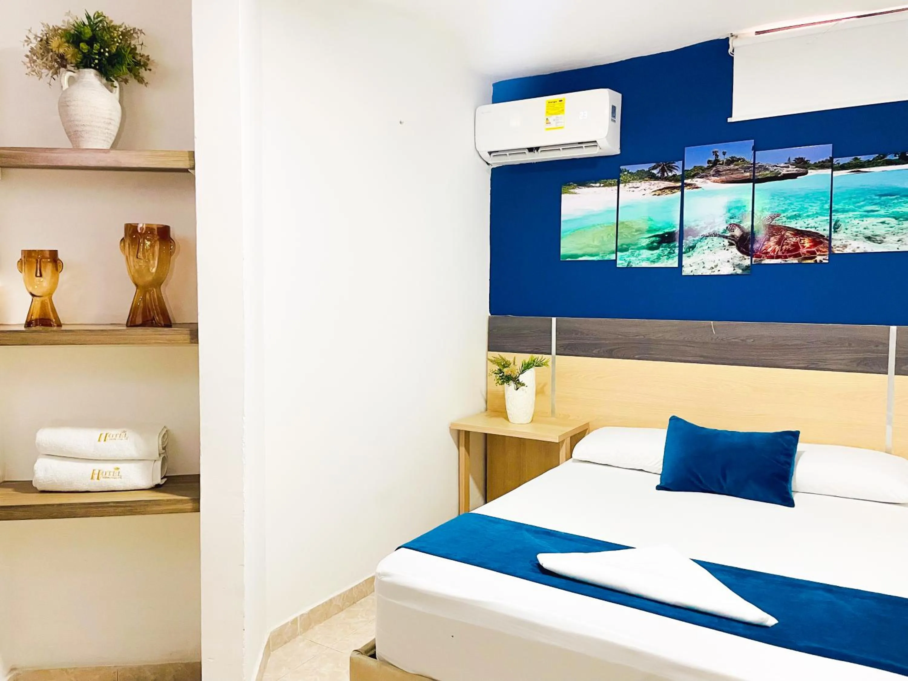 Bed in Hotel Caribe Real Inn