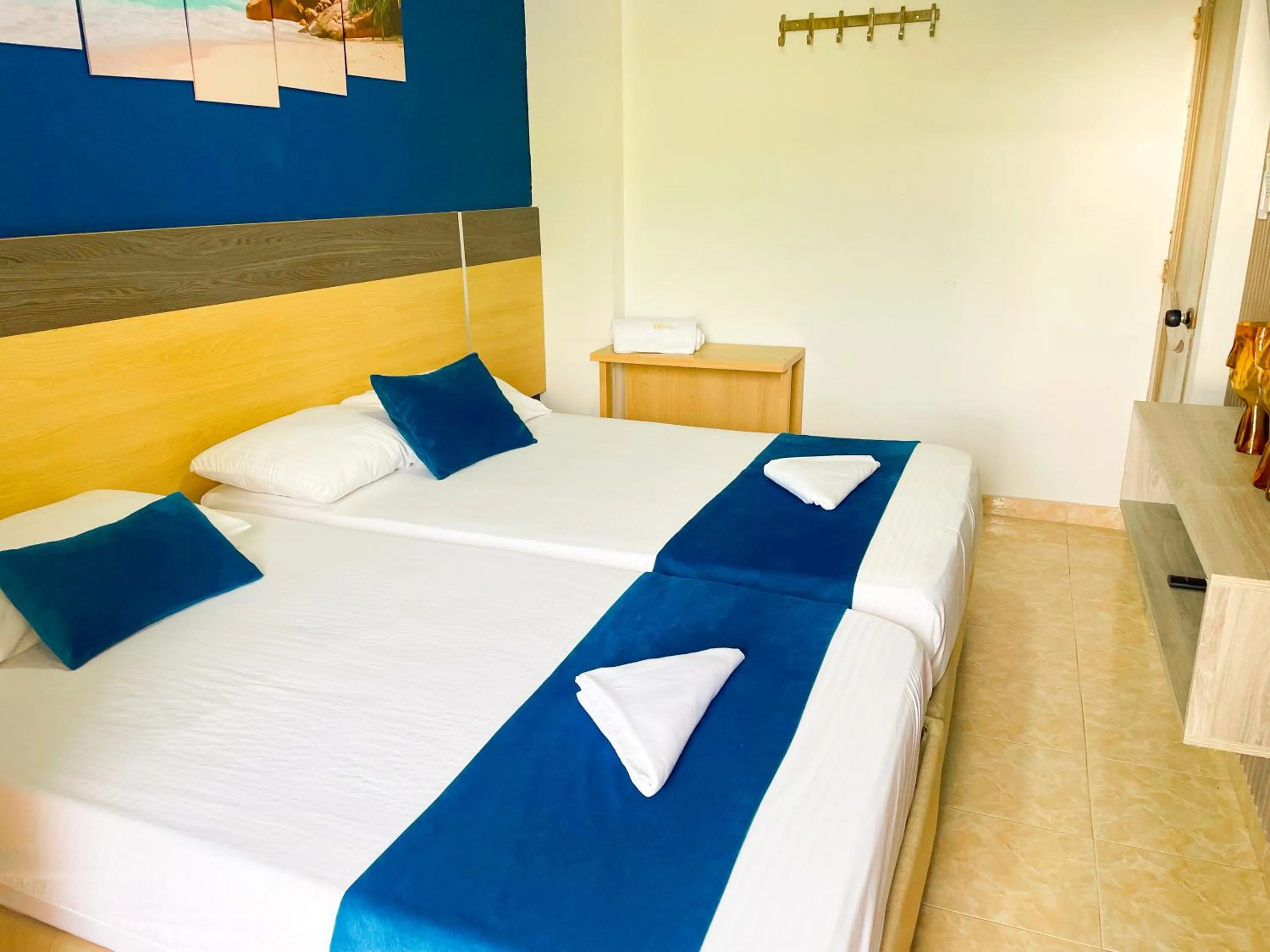 Bed in Hotel Caribe Real Inn