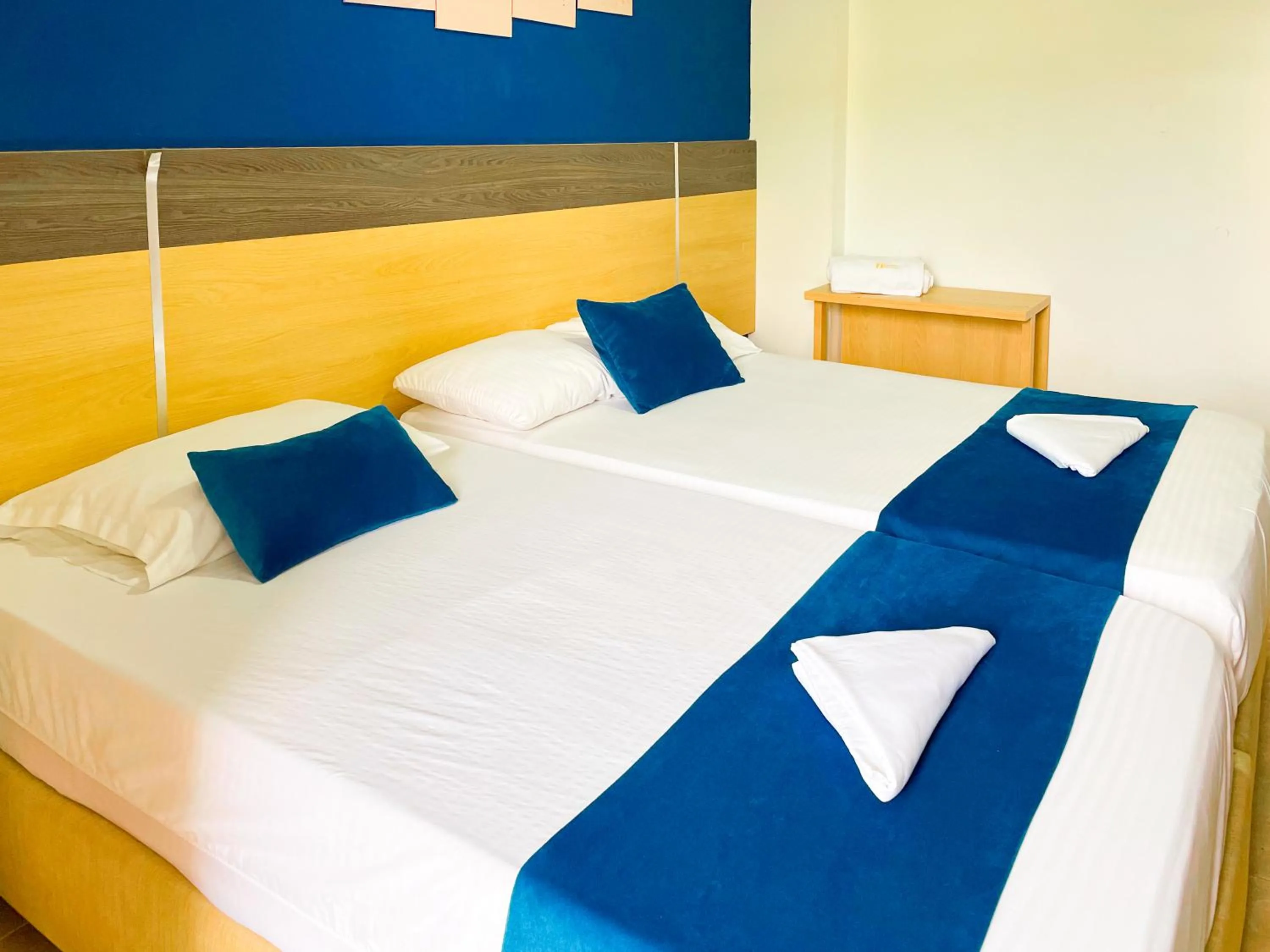 Bed in Hotel Caribe Real Inn