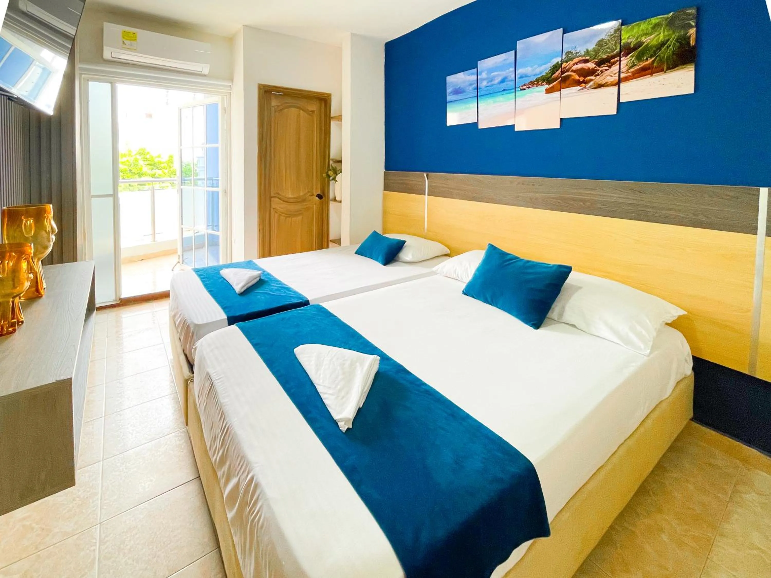 Bed in Hotel Caribe Real Inn