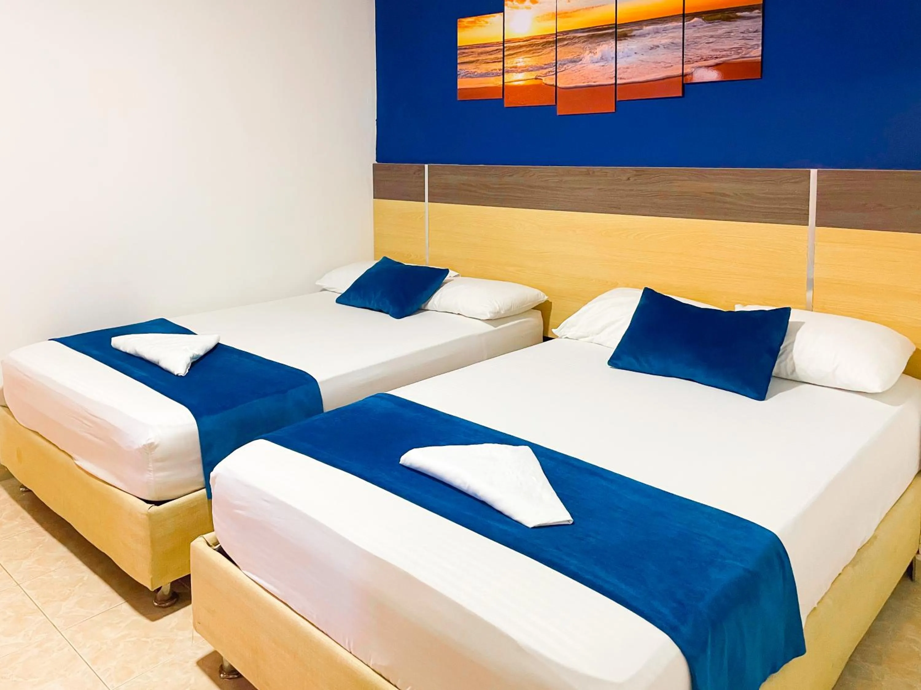 Bed in Hotel Caribe Real Inn