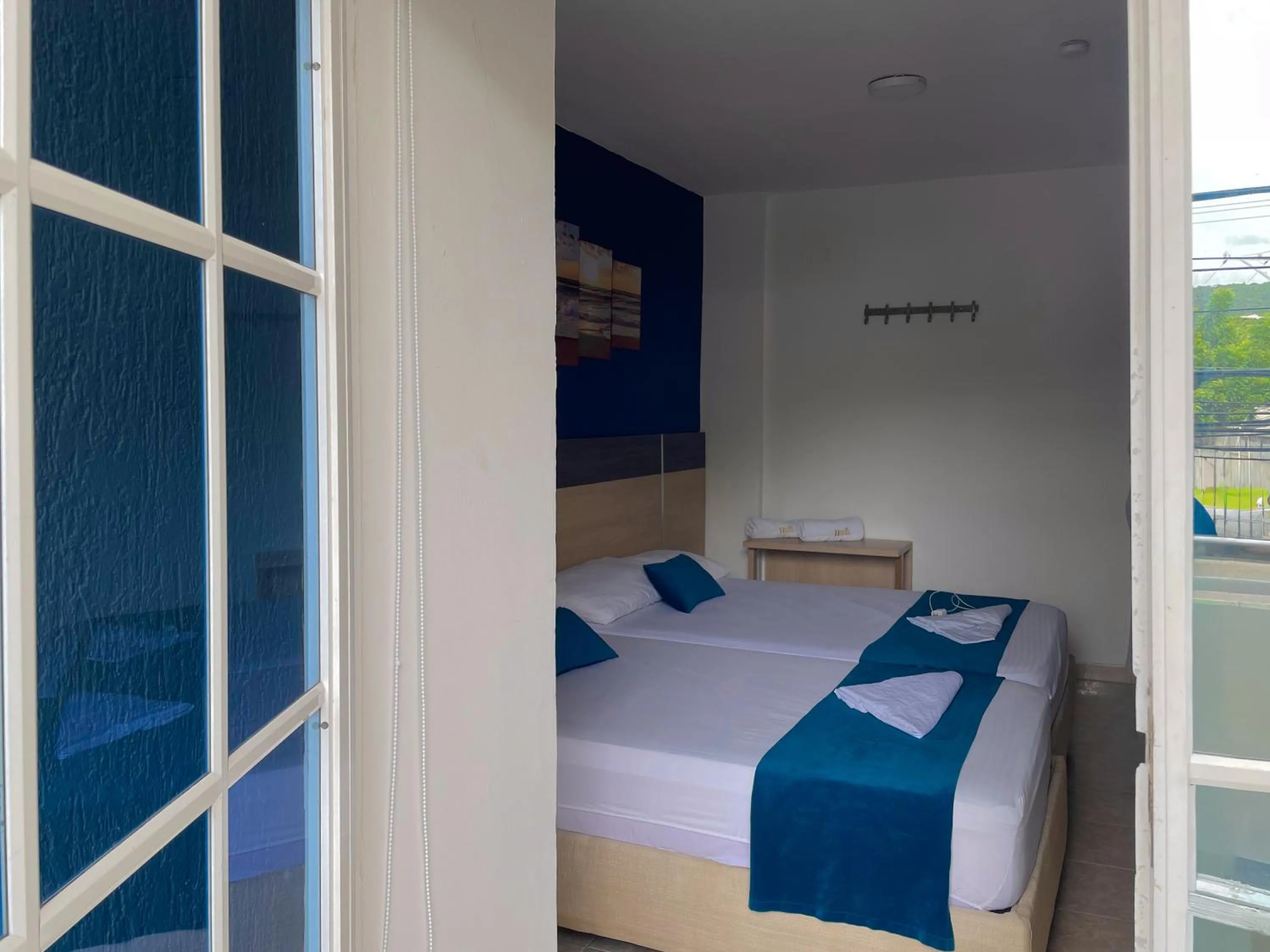 Balcony/Terrace, Bed in Hotel Caribe Real Inn