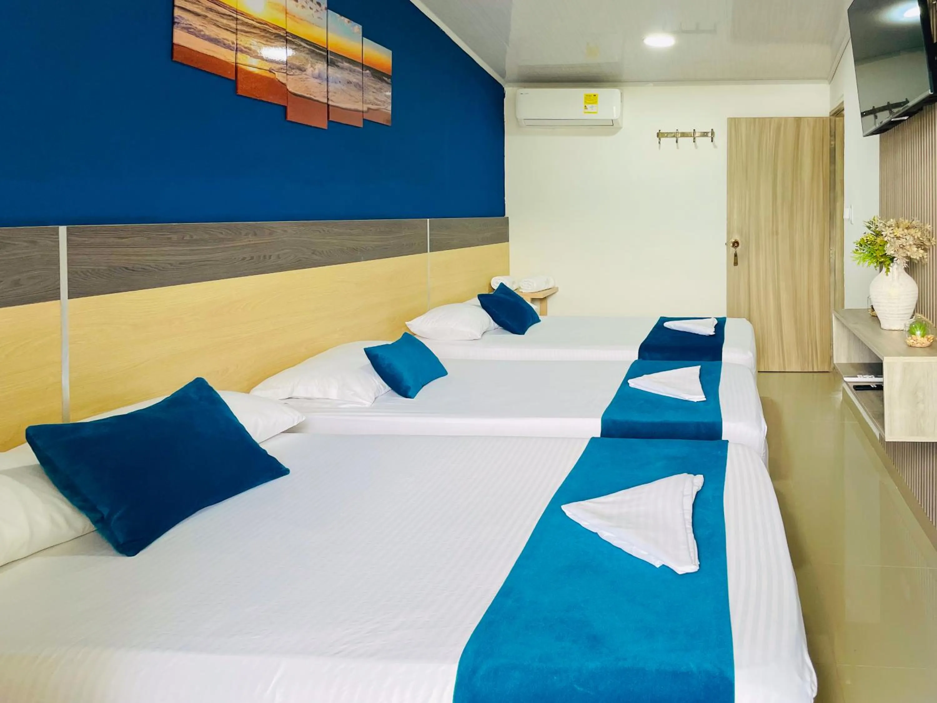 Bed in Hotel Caribe Real Inn