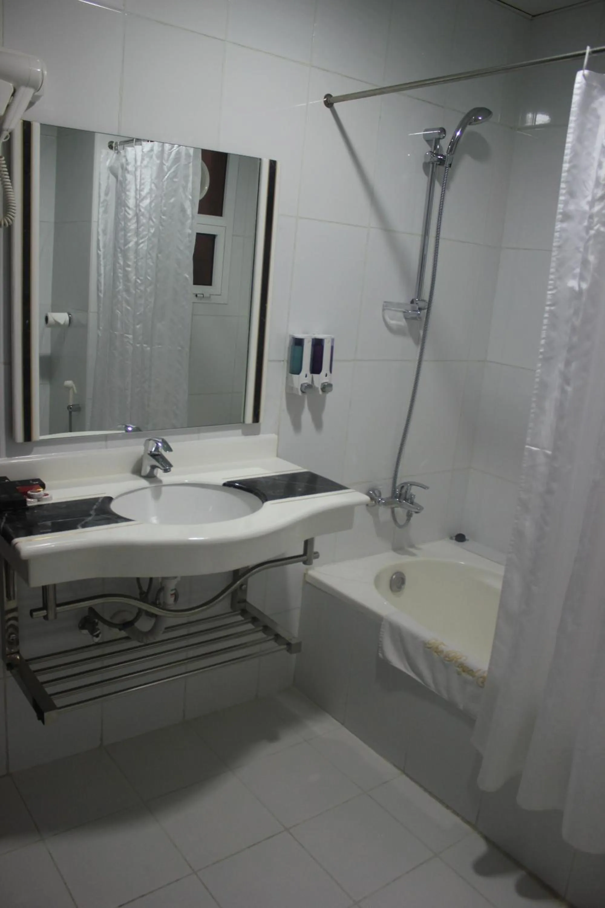 Shower in Royal Gardens Hotel