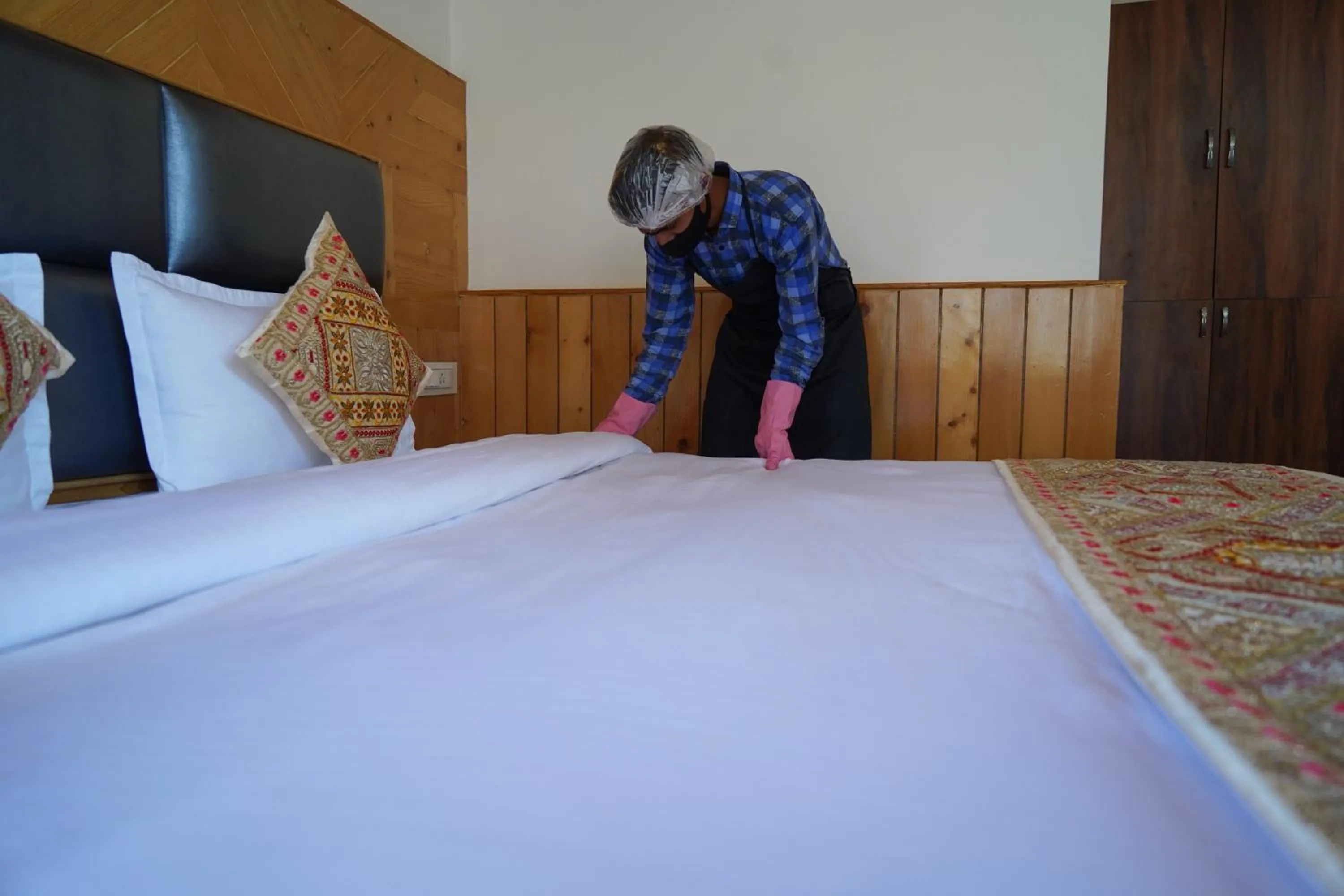 Staff, Bed in Amarys Boutique Stays Manali