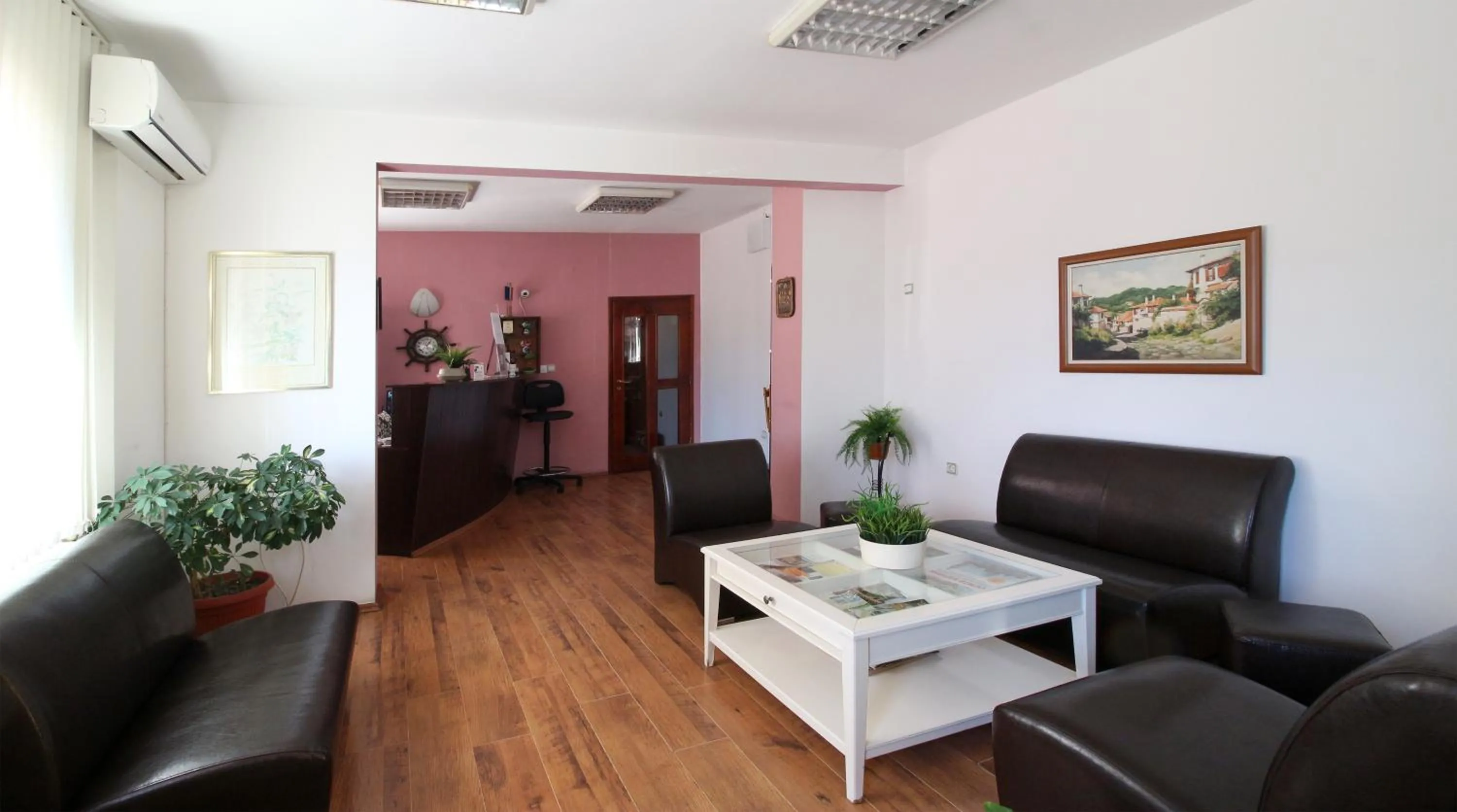 Lobby or reception in Family Hotel Flora