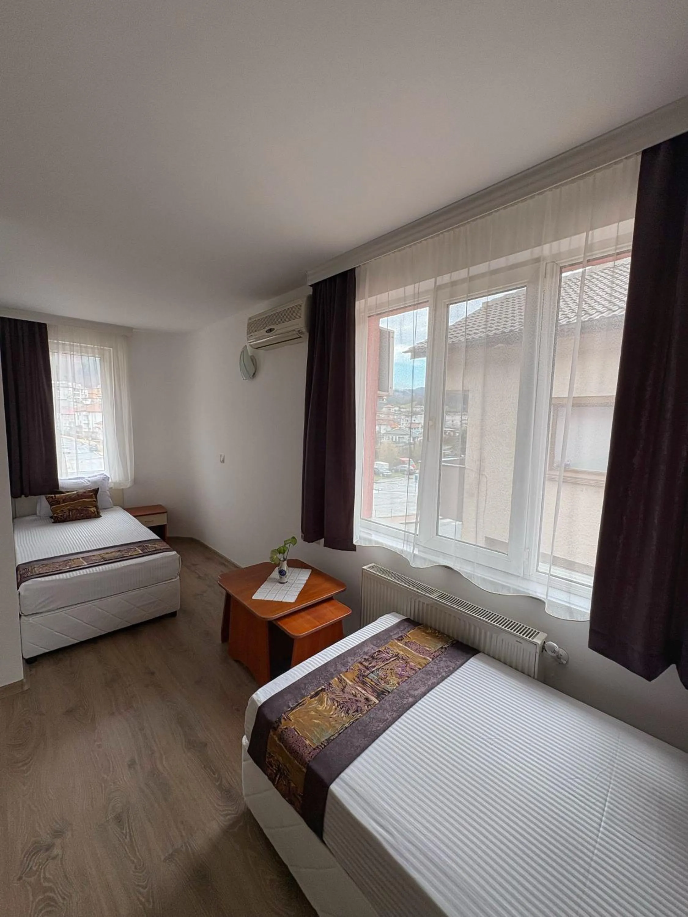 Bed in Family Hotel Flora