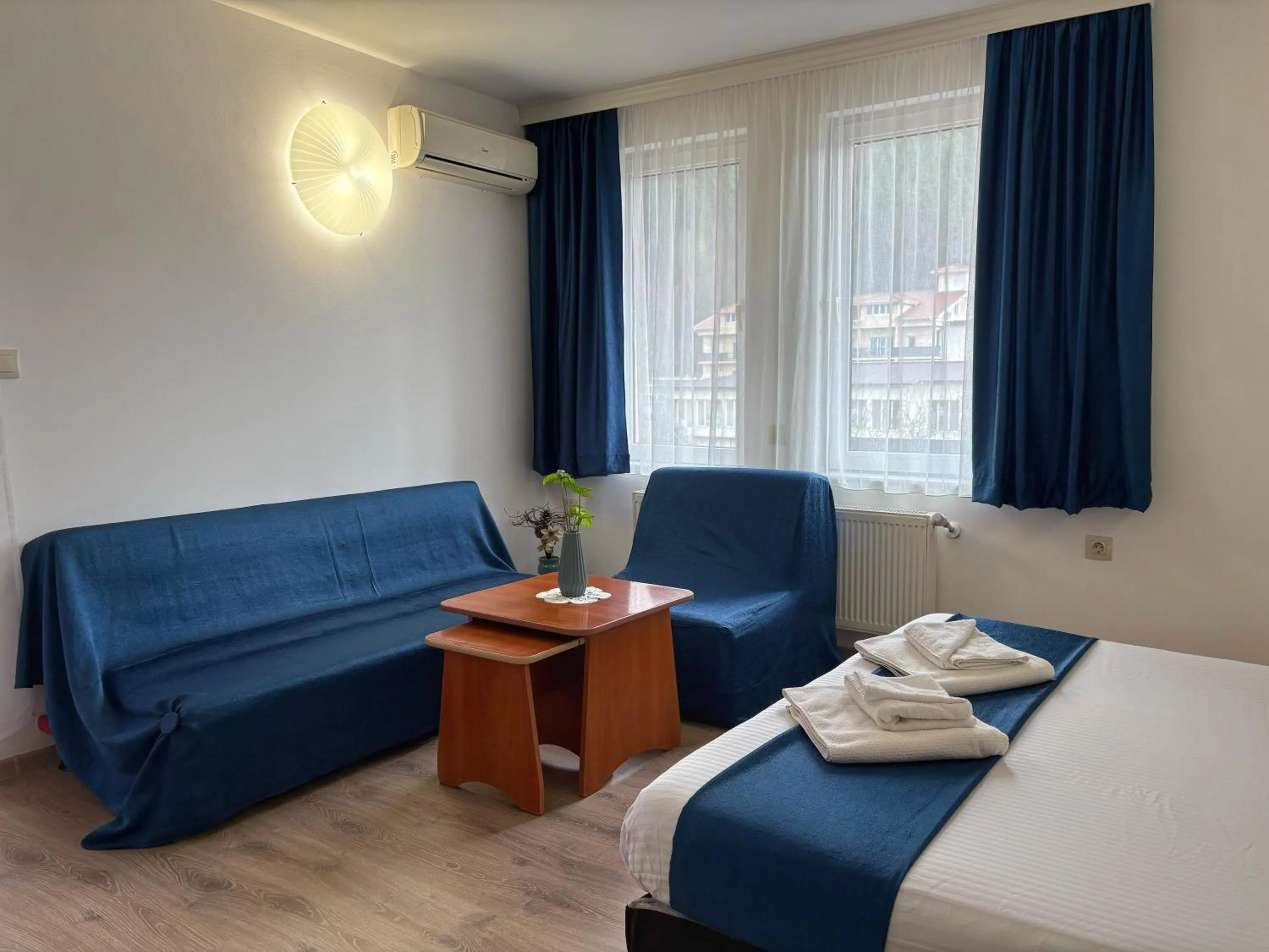 Bed in Family Hotel Flora