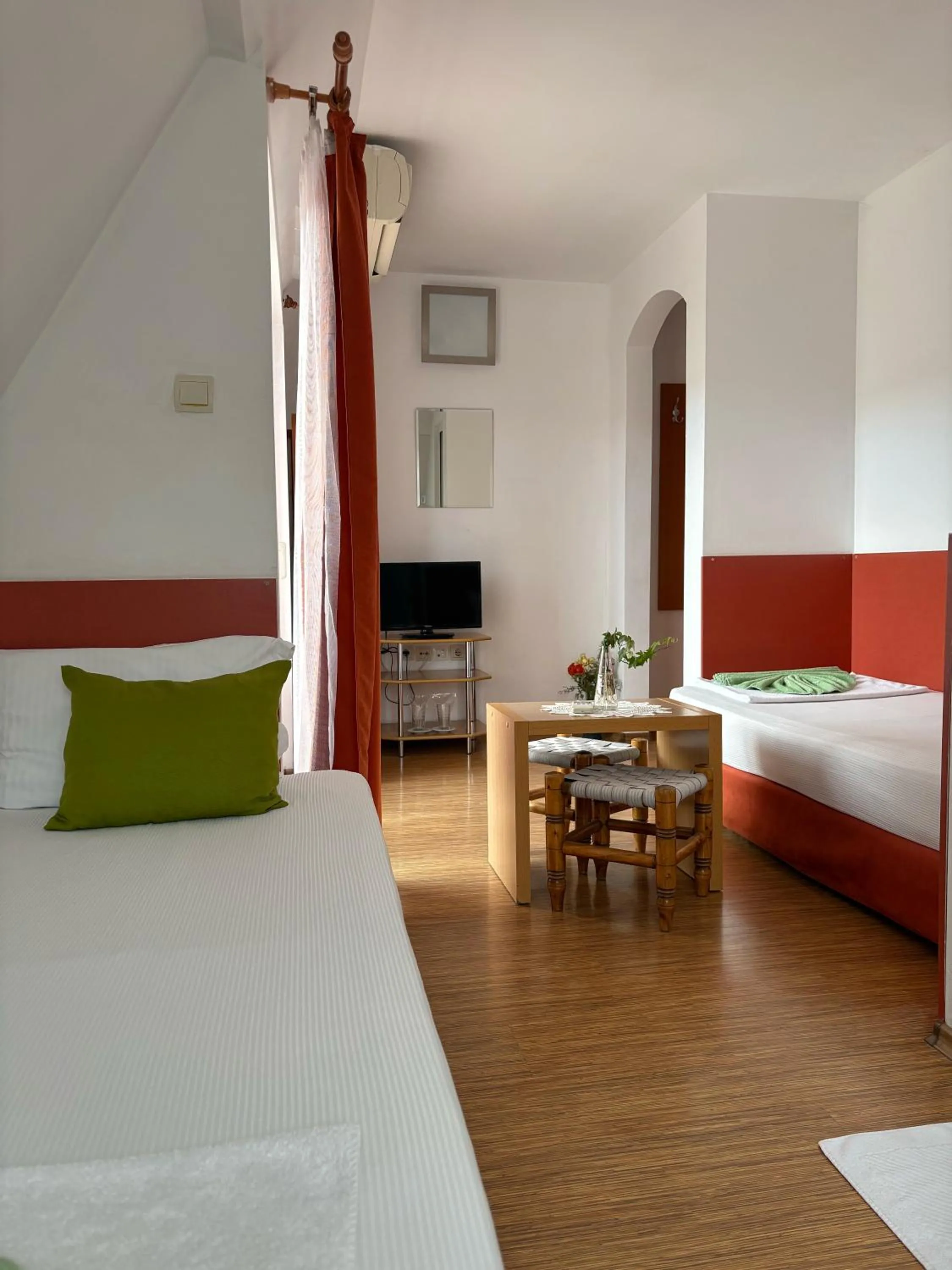 Bed in Family Hotel Flora