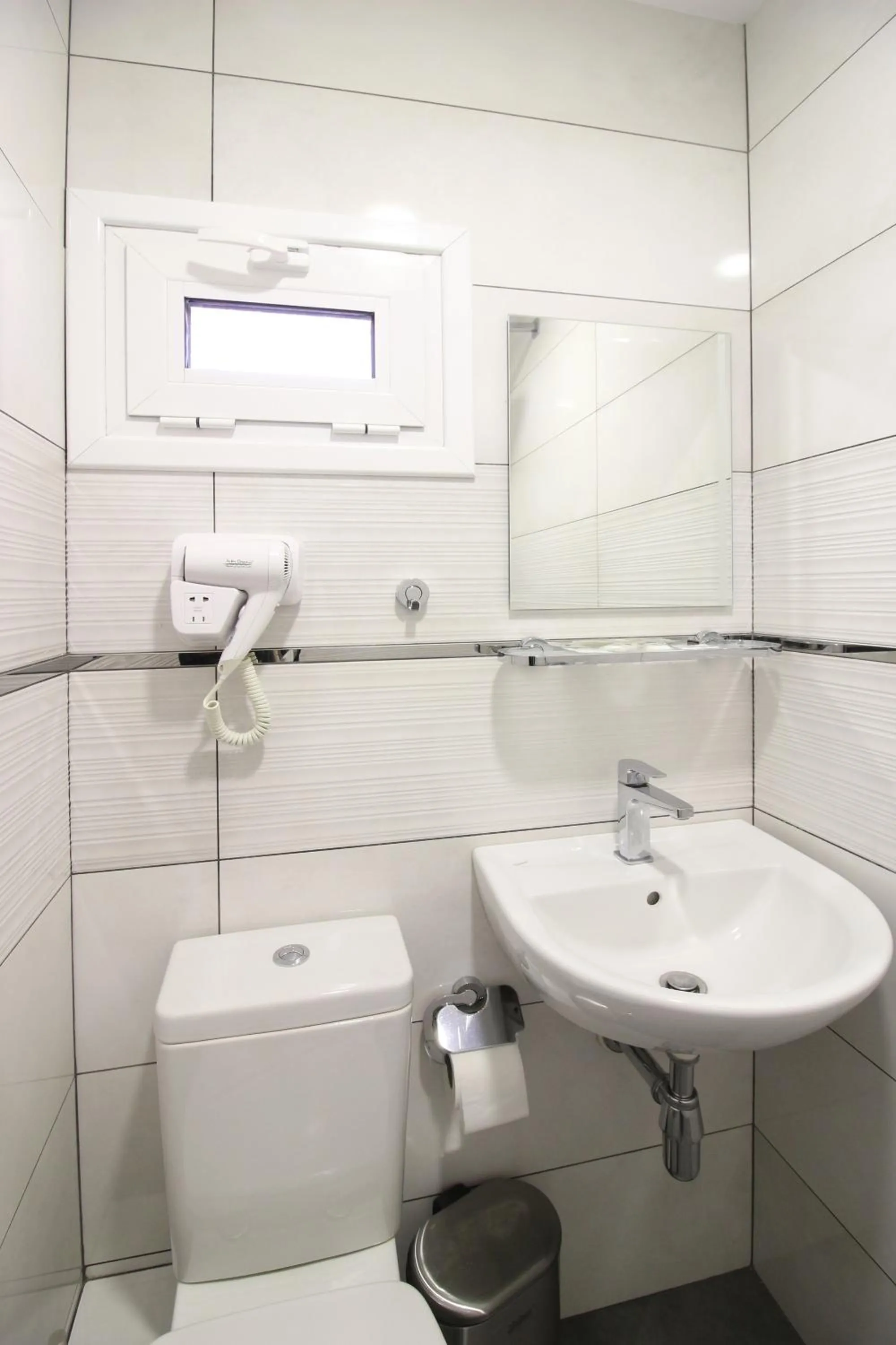 Bathroom in Family Hotel Flora