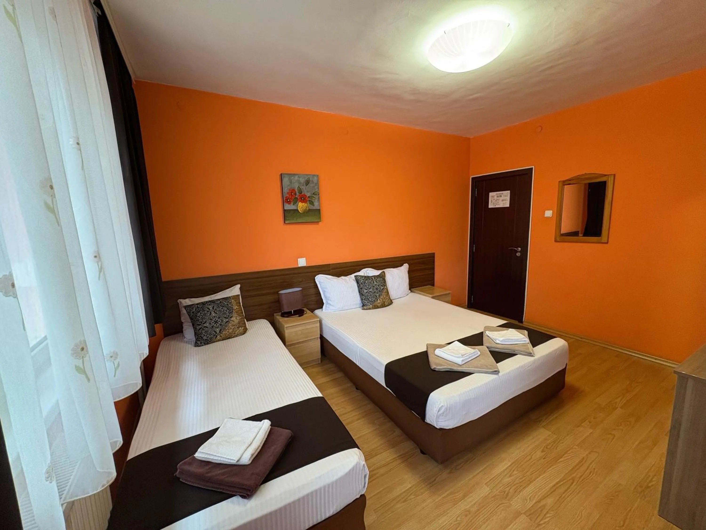 Bed in Family Hotel Flora