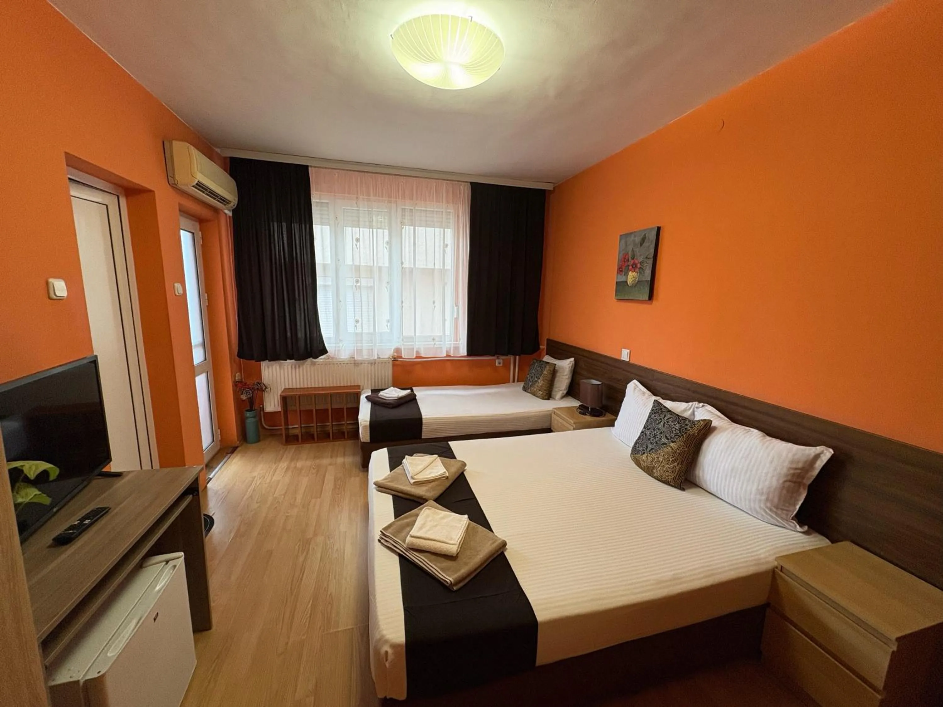 Bed in Family Hotel Flora