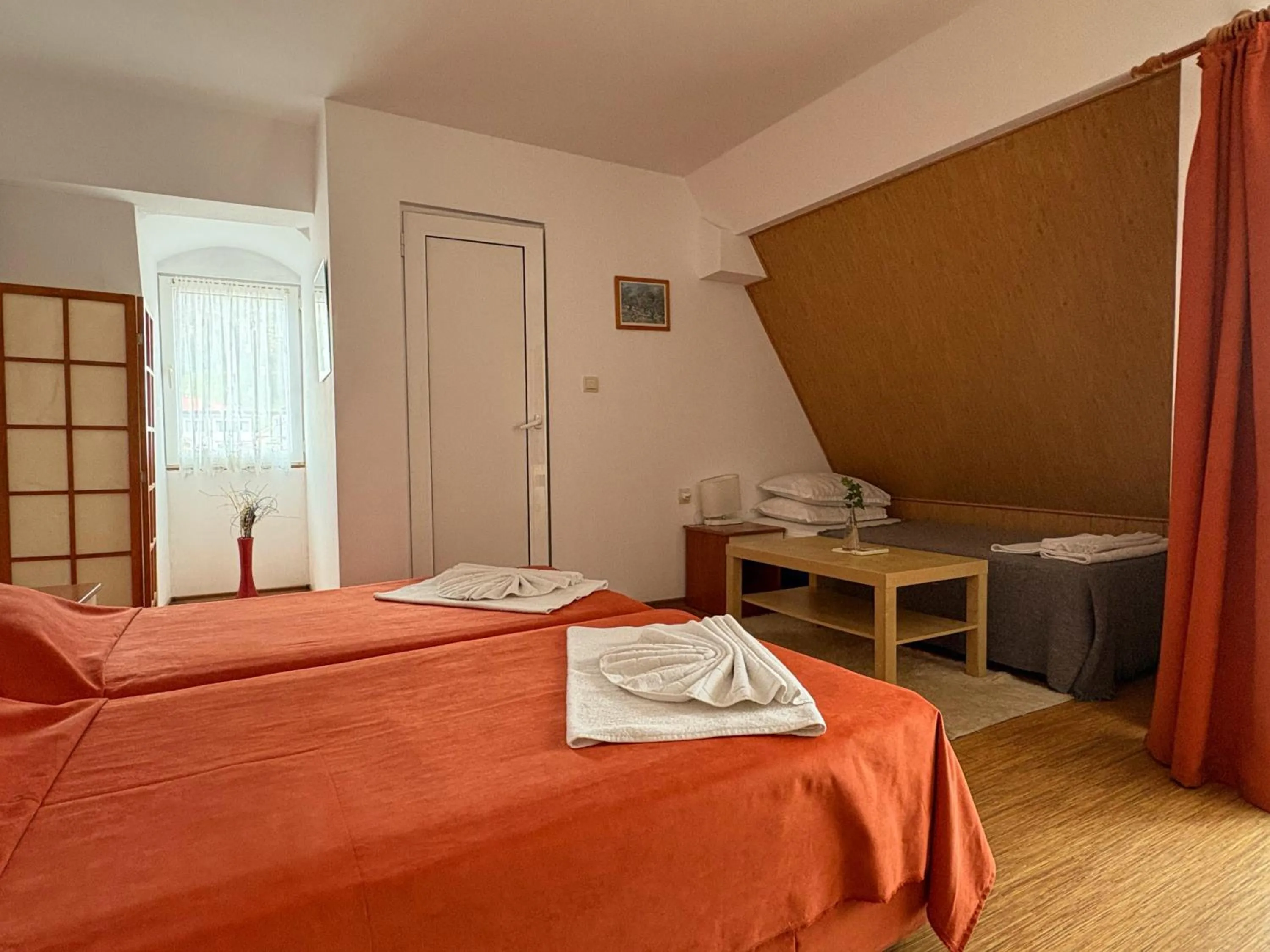 Bed in Family Hotel Flora