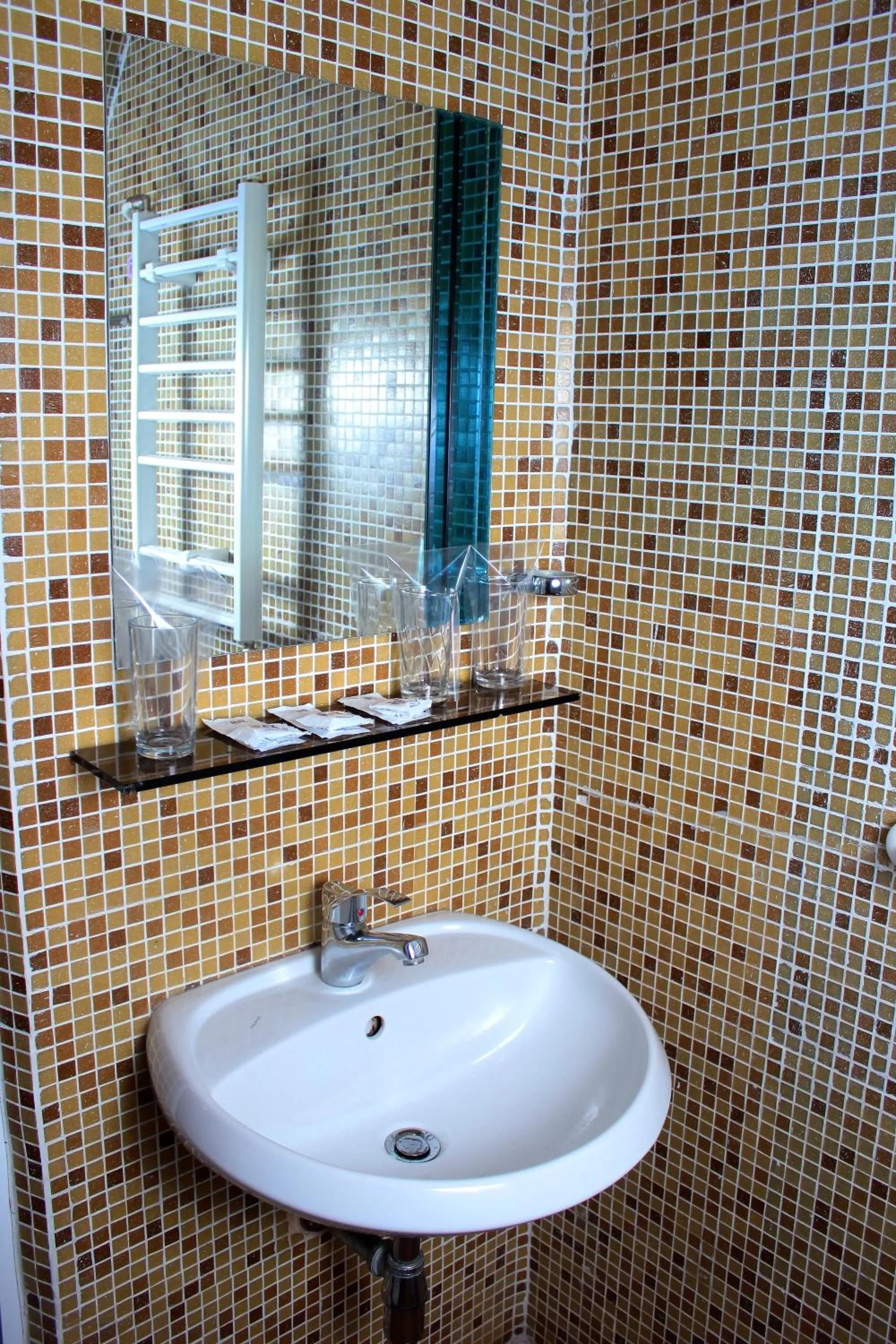 Bathroom in Family Hotel Flora