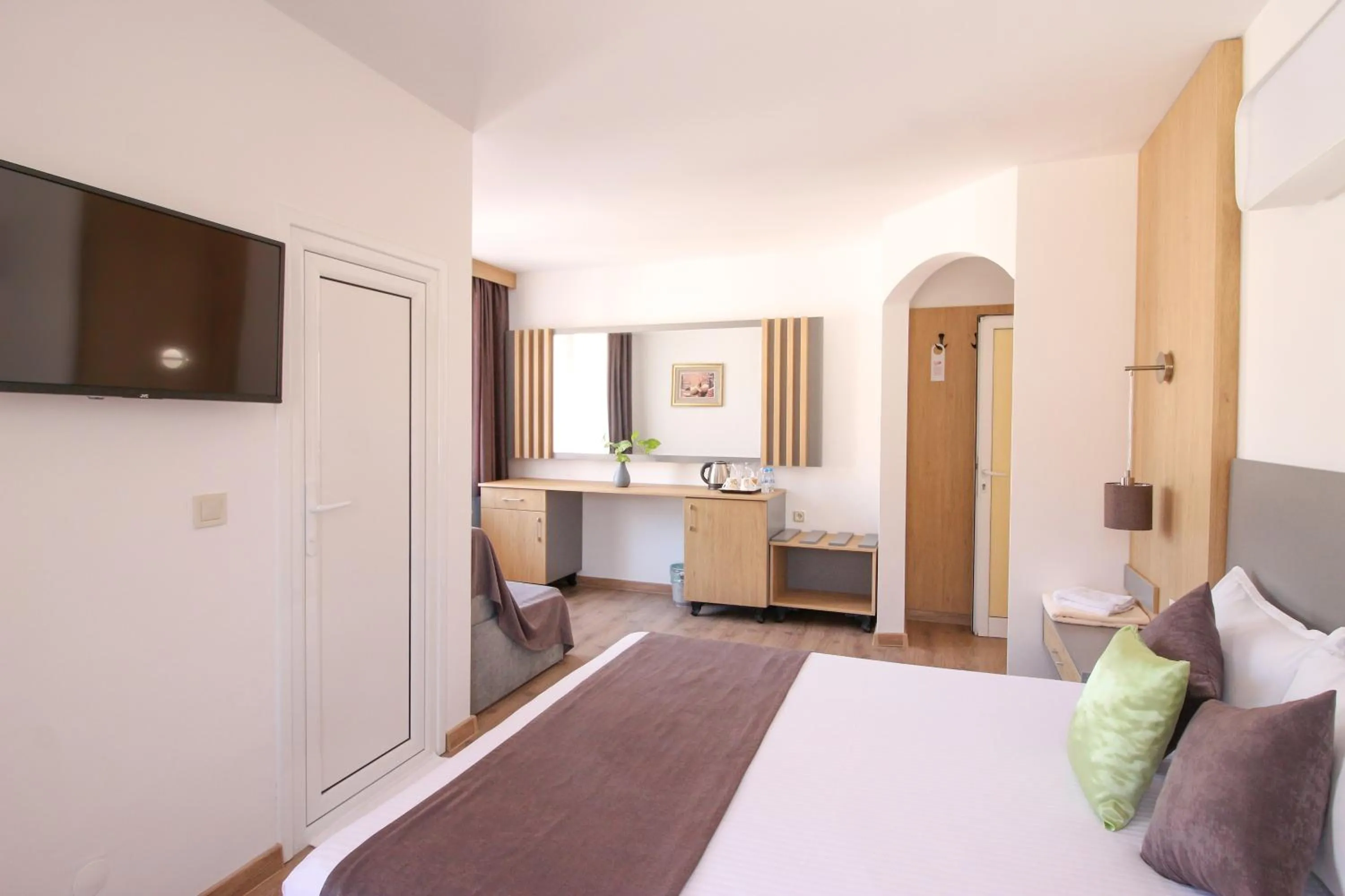 Bed in Family Hotel Flora