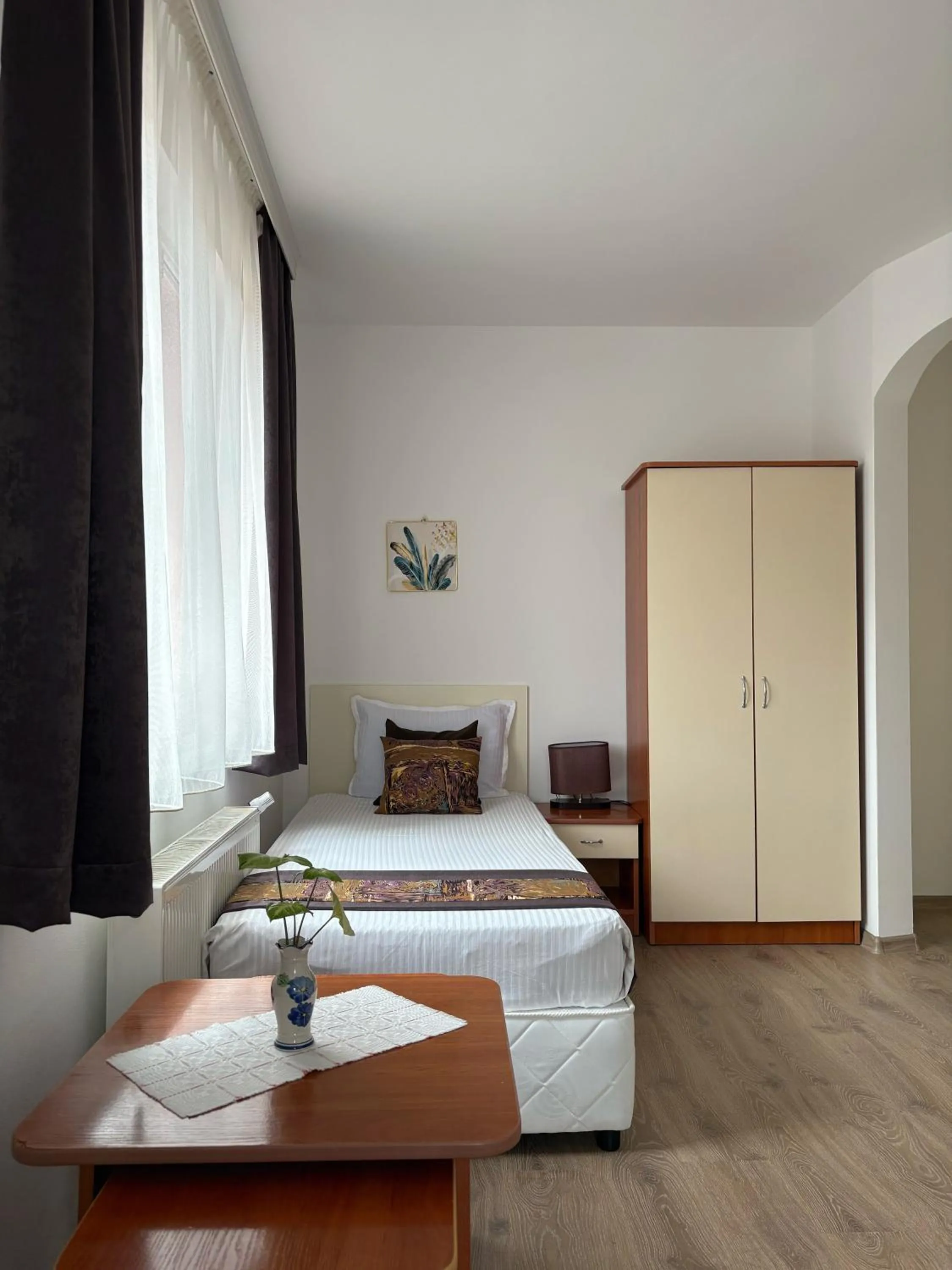 Bed in Family Hotel Flora