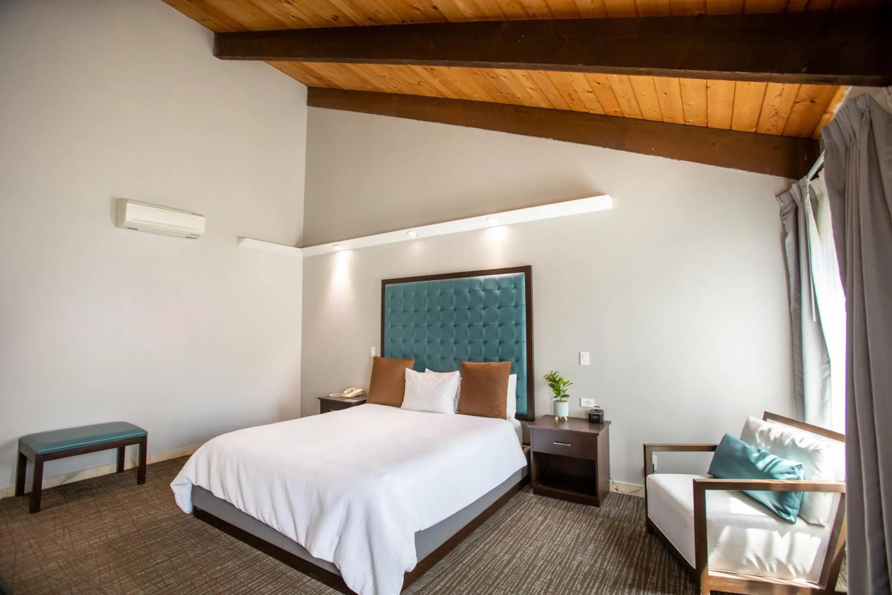 Bed in Munras Inn Bed in Munras Inn