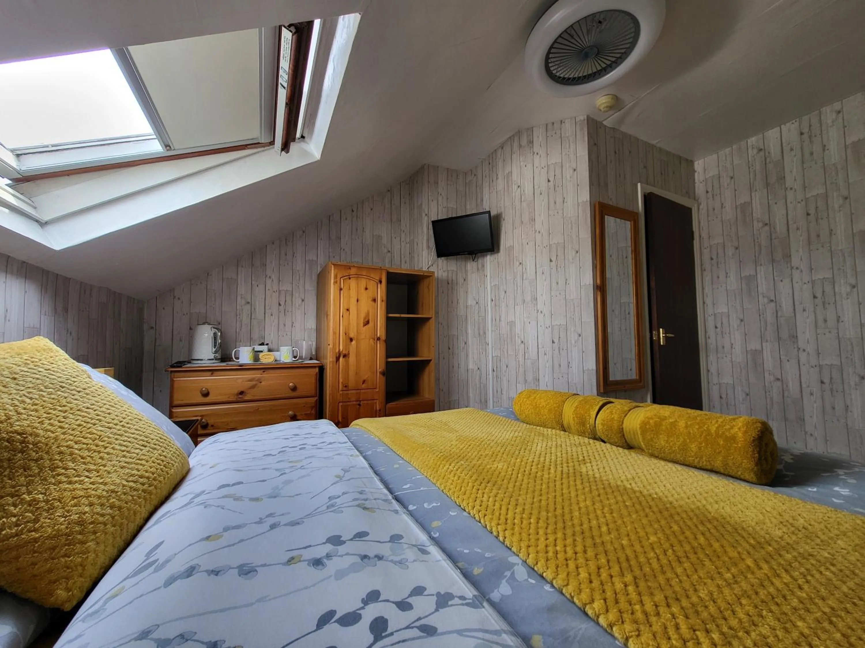 Bed in Daffodil Guest House