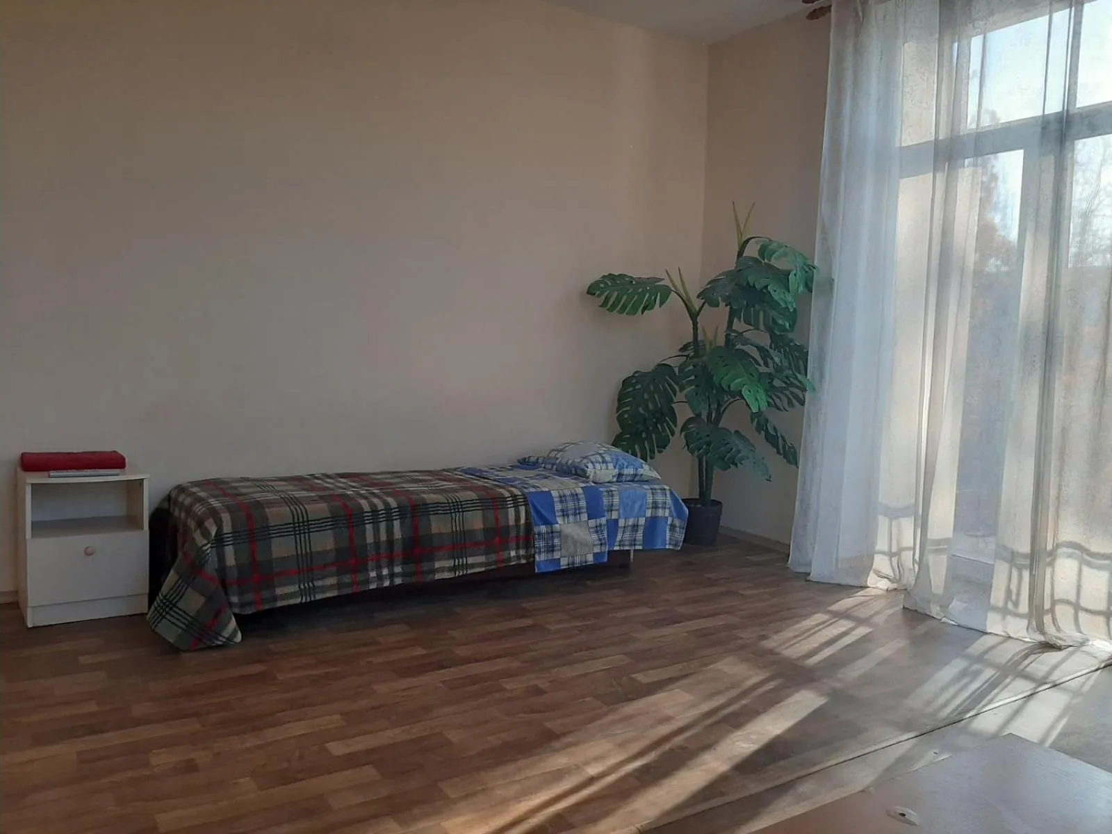 Bed in Apart-Hotel Parasolka