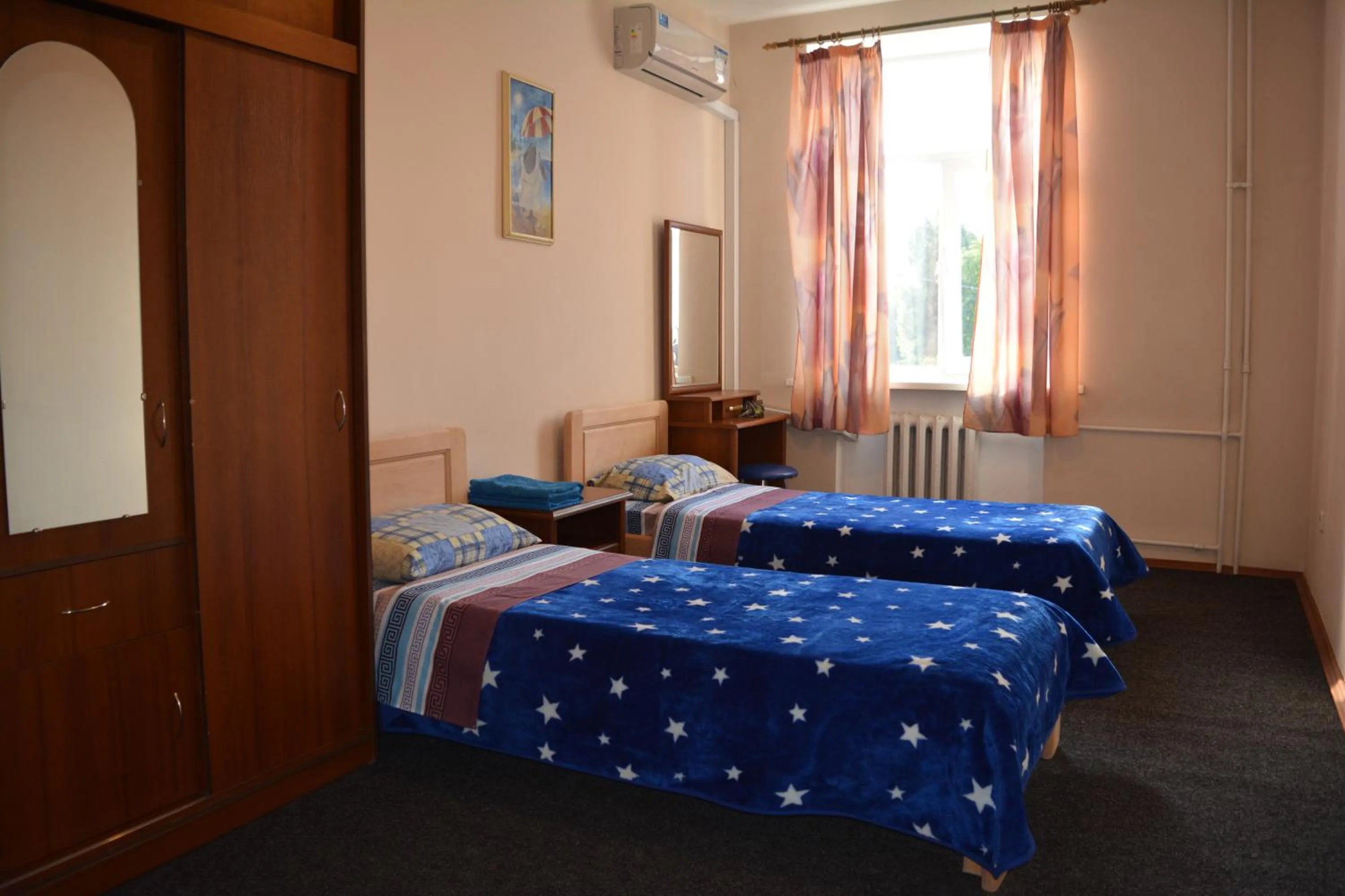 Bed in Apart-Hotel Parasolka