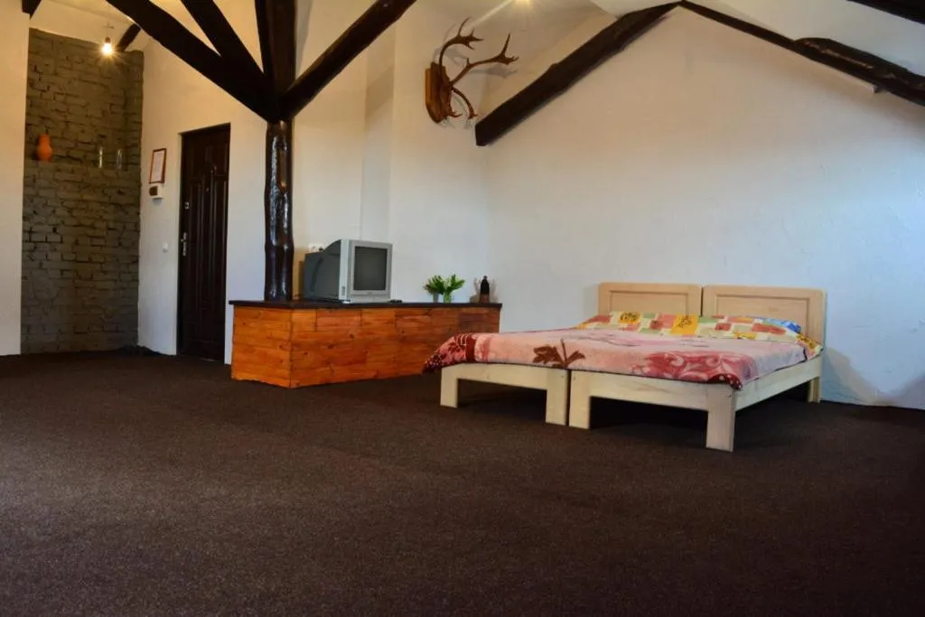Bed in Apart-Hotel Parasolka