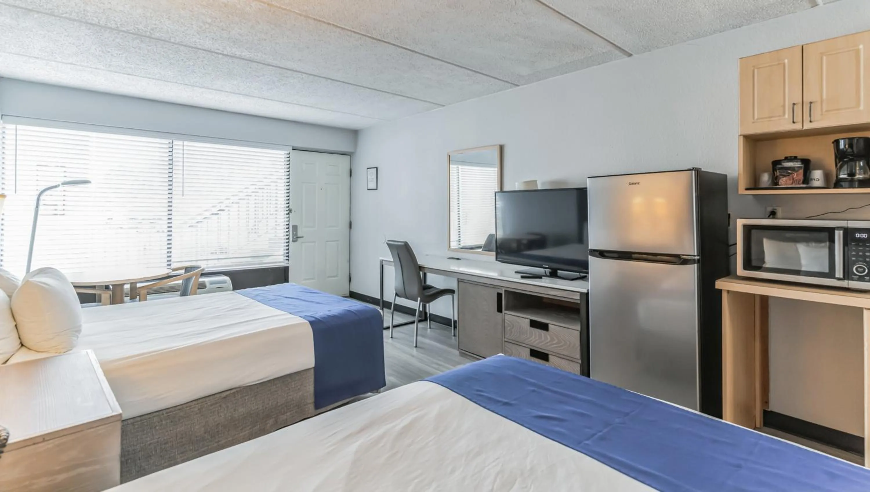 Bedroom, Bed in Home 1 Suites Extended Stay - Kissimmee