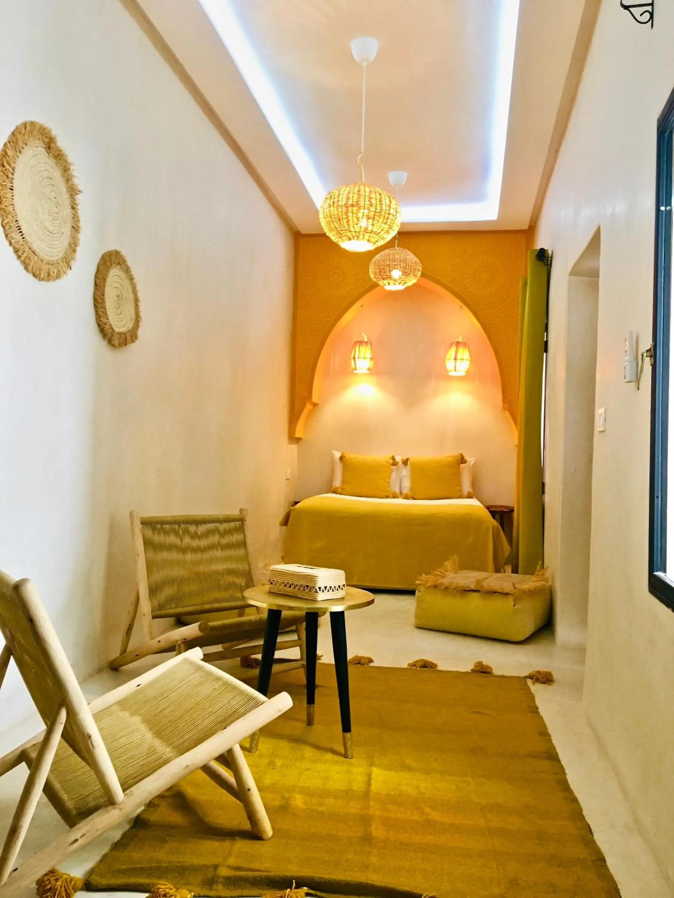 Seating area, Bed in Riad Olika