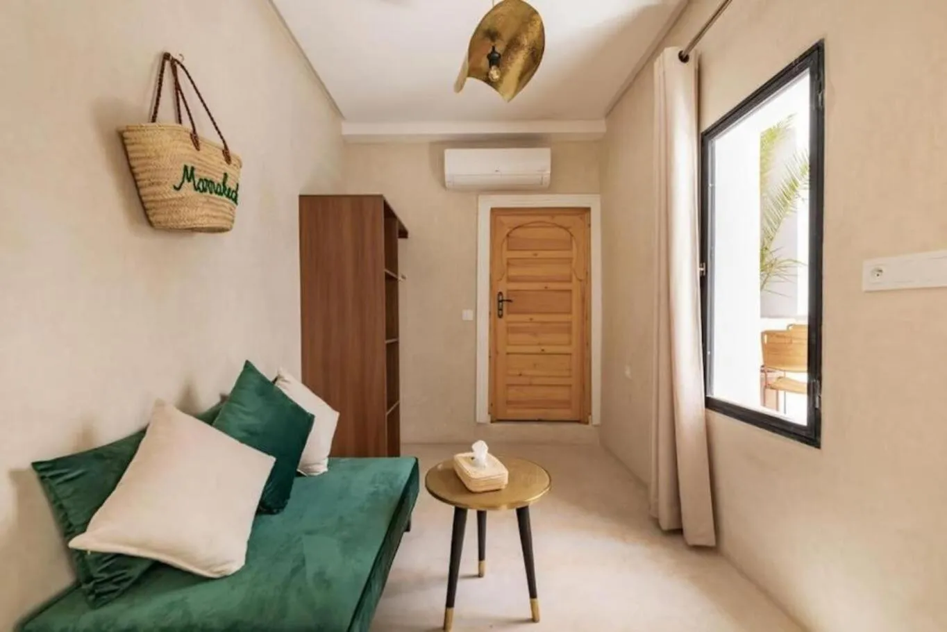 Living room, Bed in Riad Olika