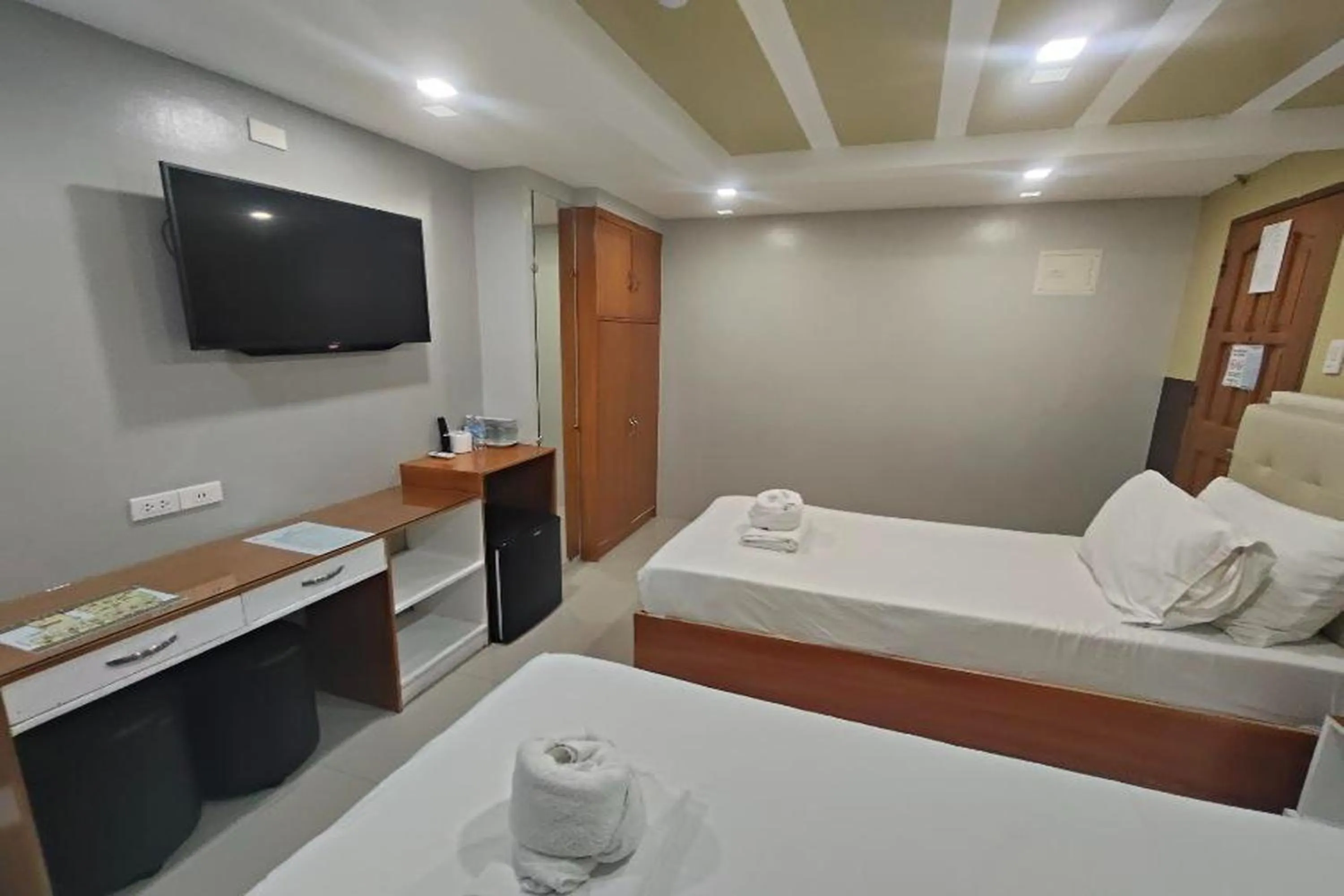 Photo of the whole room, Bed in Taj Hotel Tuguegarao