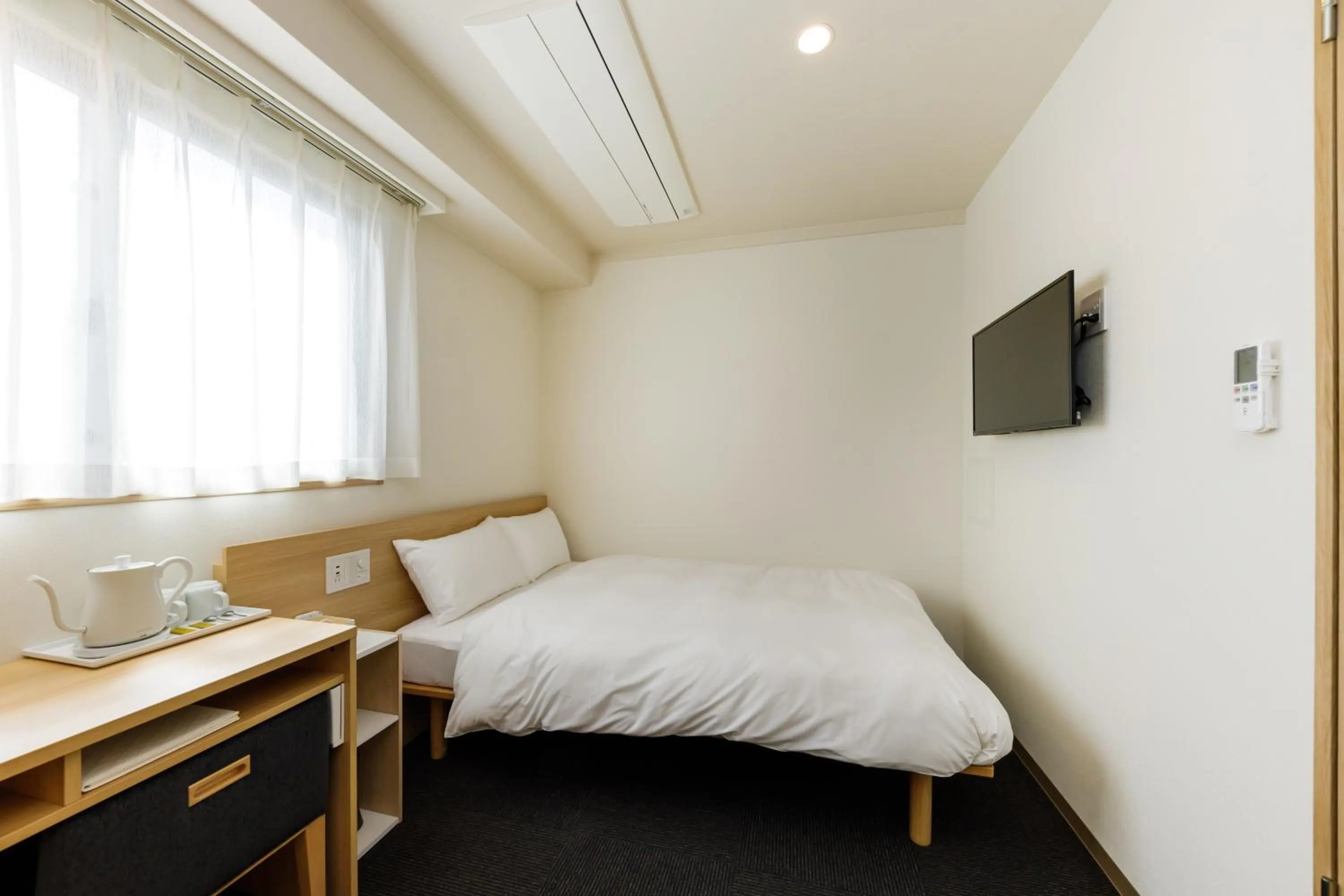 Bed in HOPETREE OSAKA GRAND