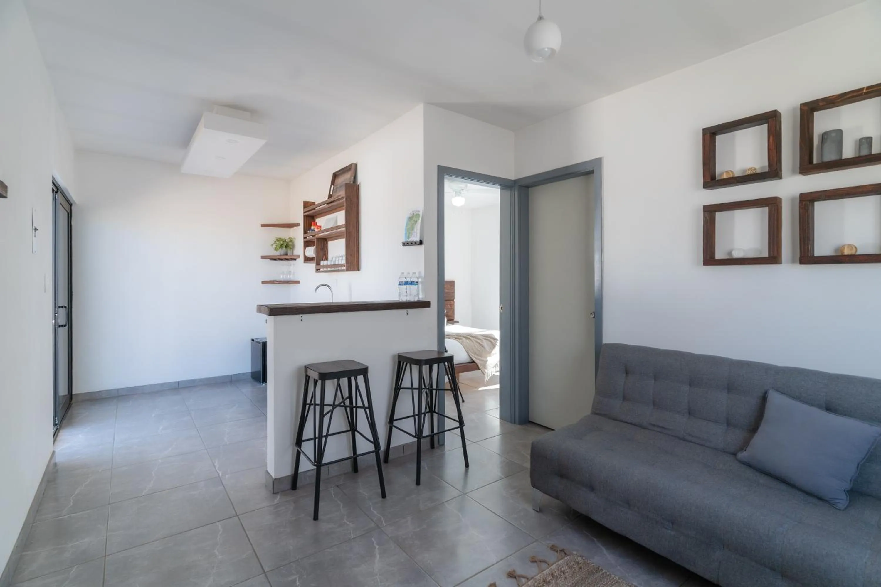 Living room in Collins Village Hotel Boutique