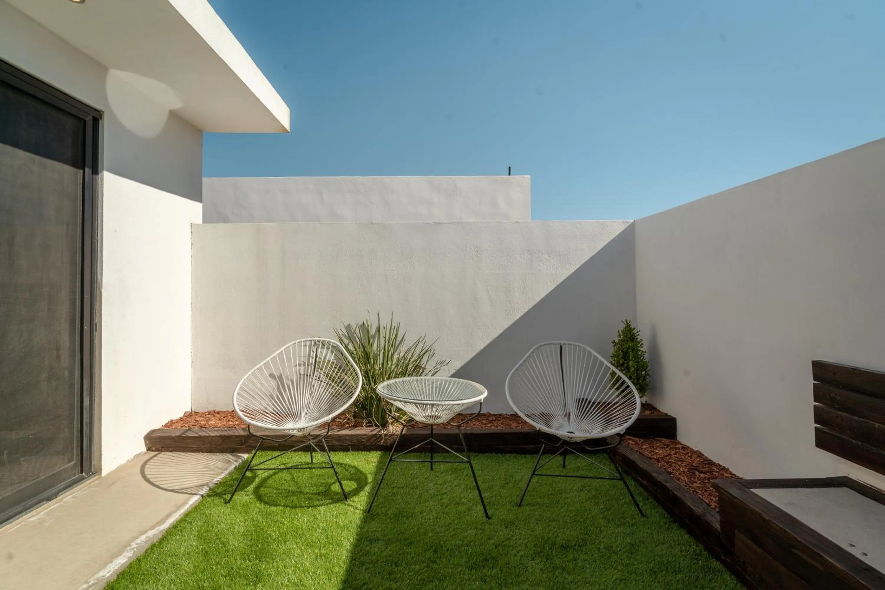 Patio in Collins Village Hotel Boutique