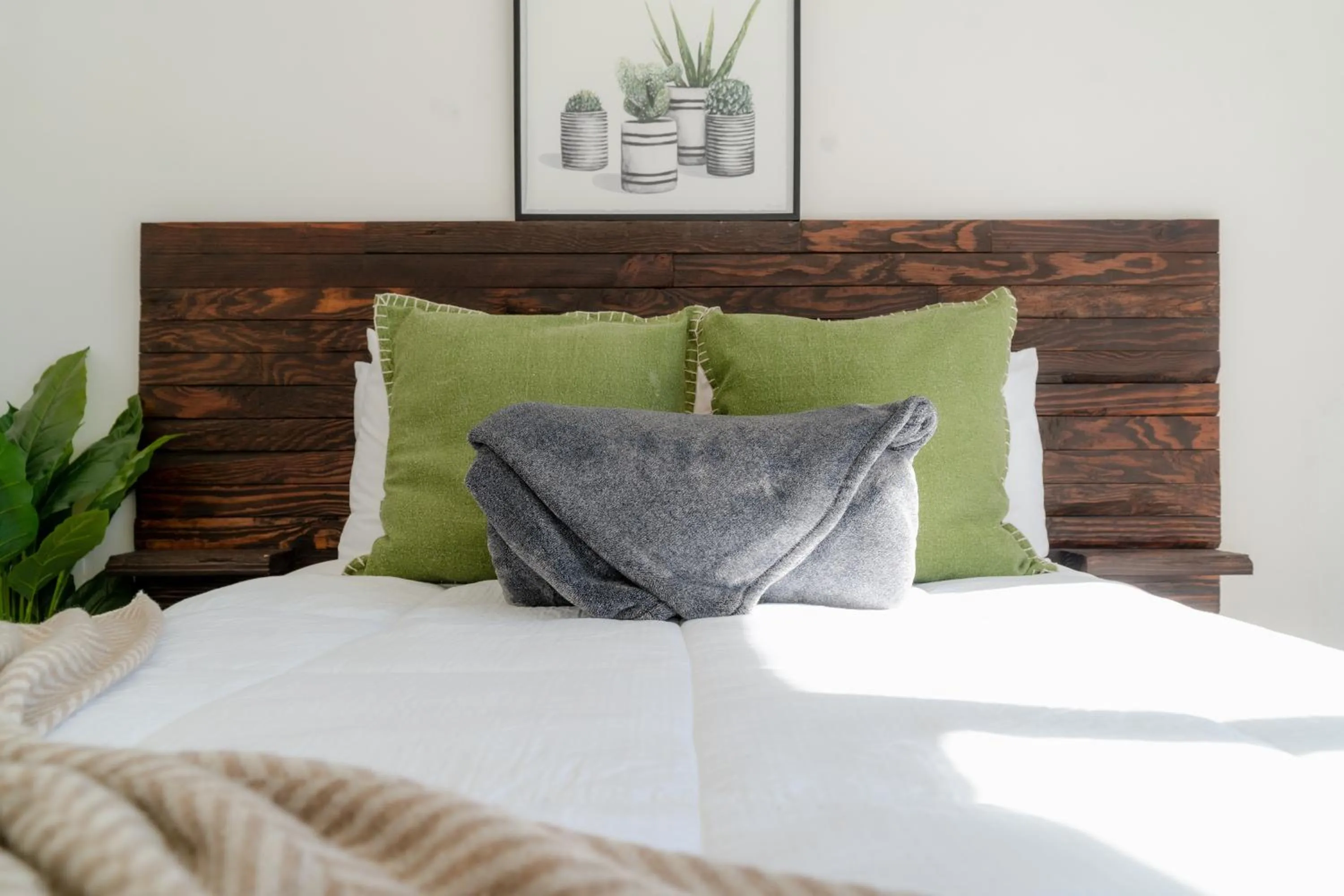 Bed in Collins Village Hotel Boutique