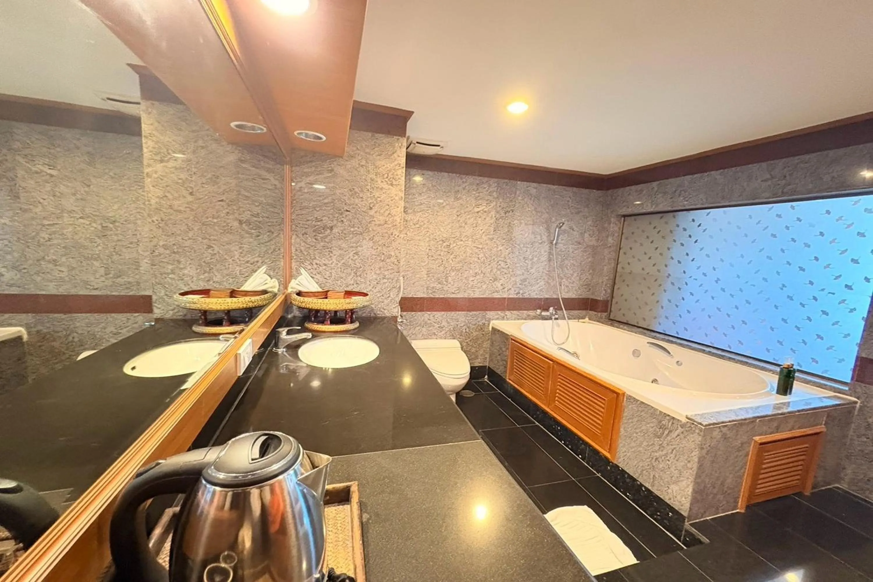 Bathroom in Taksila Hotel