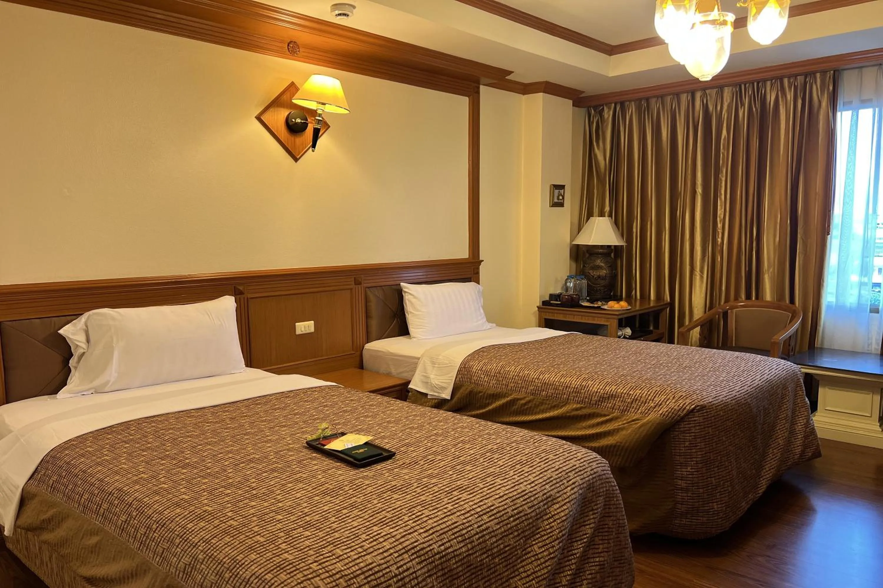 Bed in Taksila Hotel