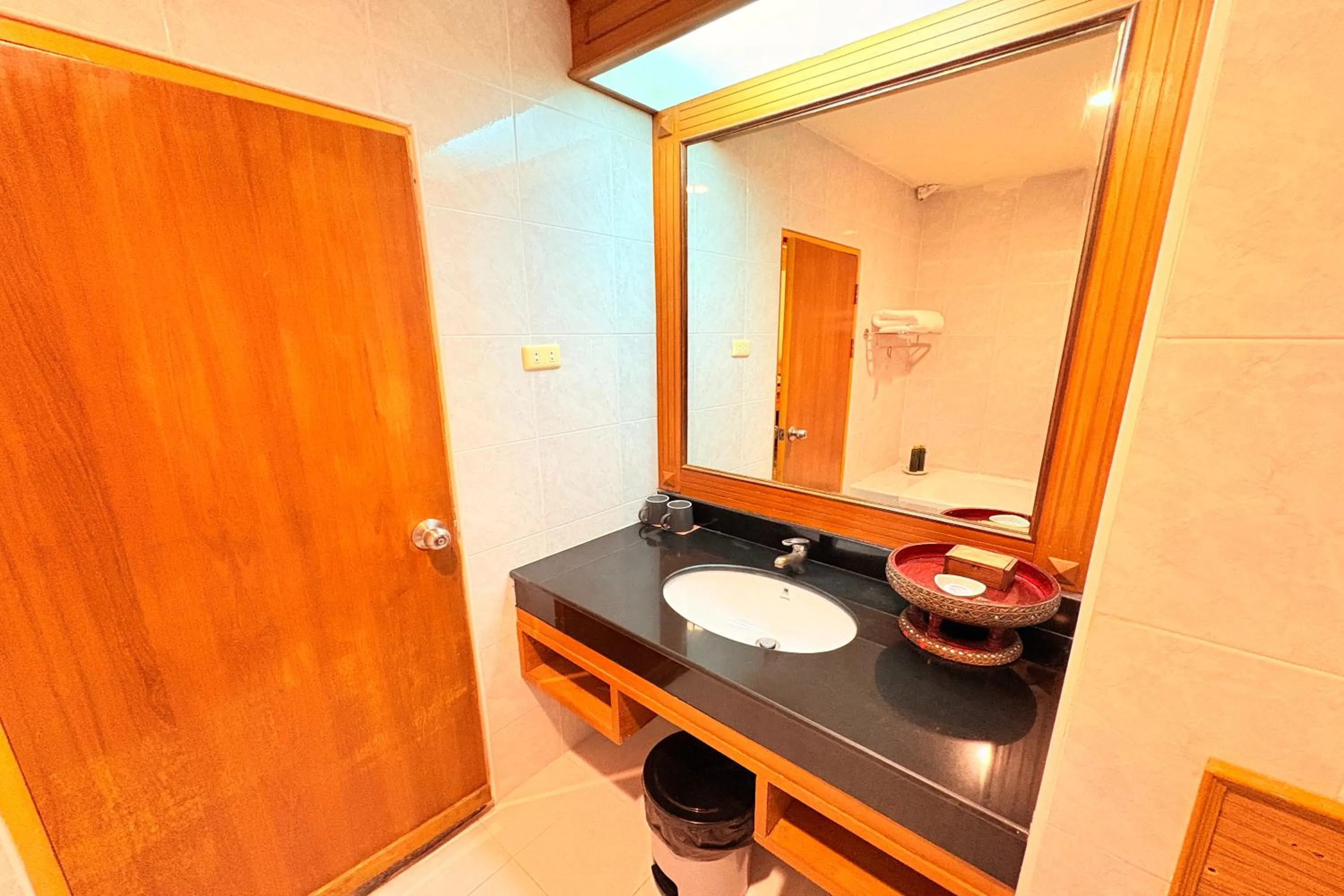 Bathroom in Taksila Hotel