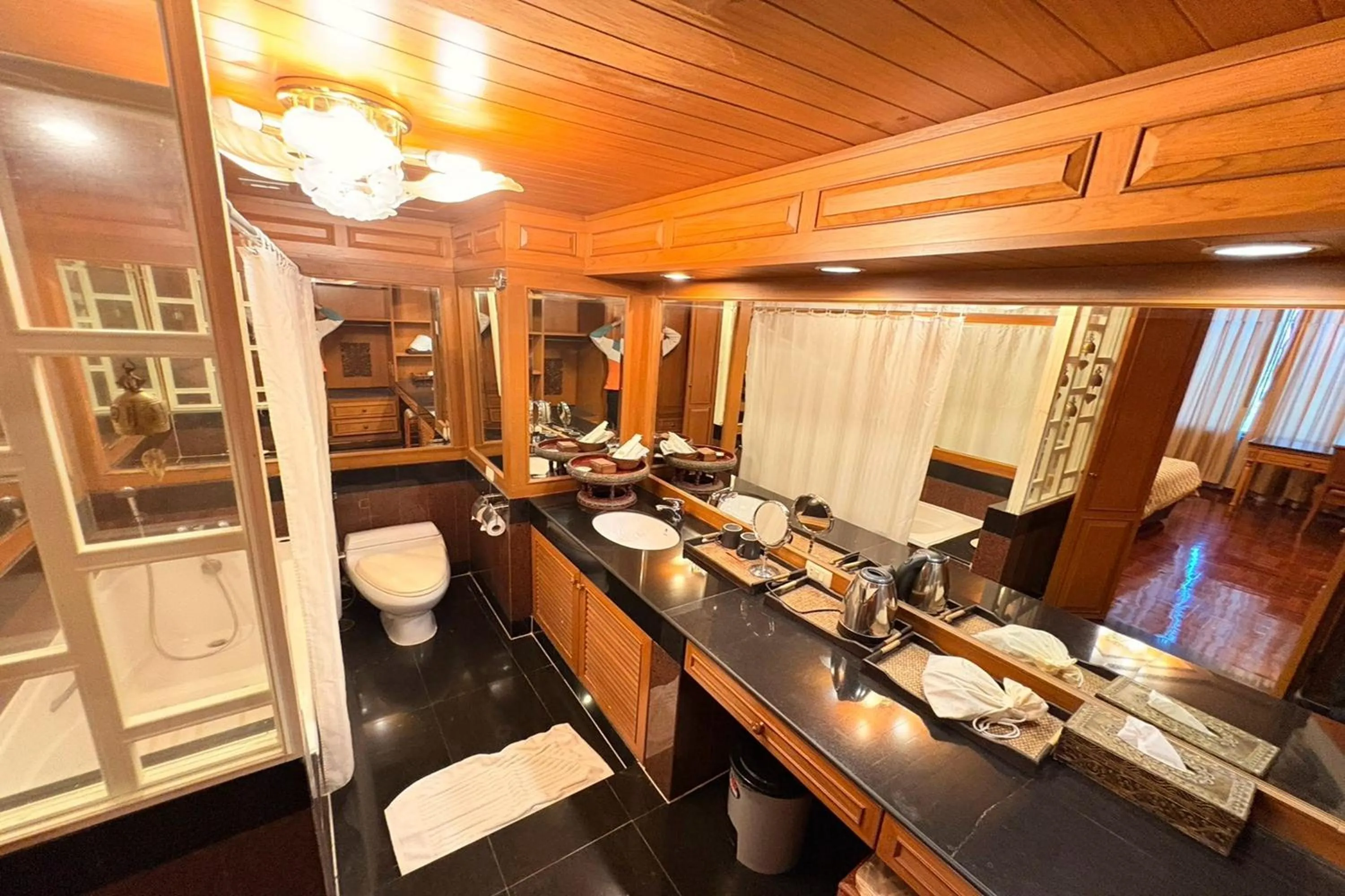 Bathroom in Taksila Hotel